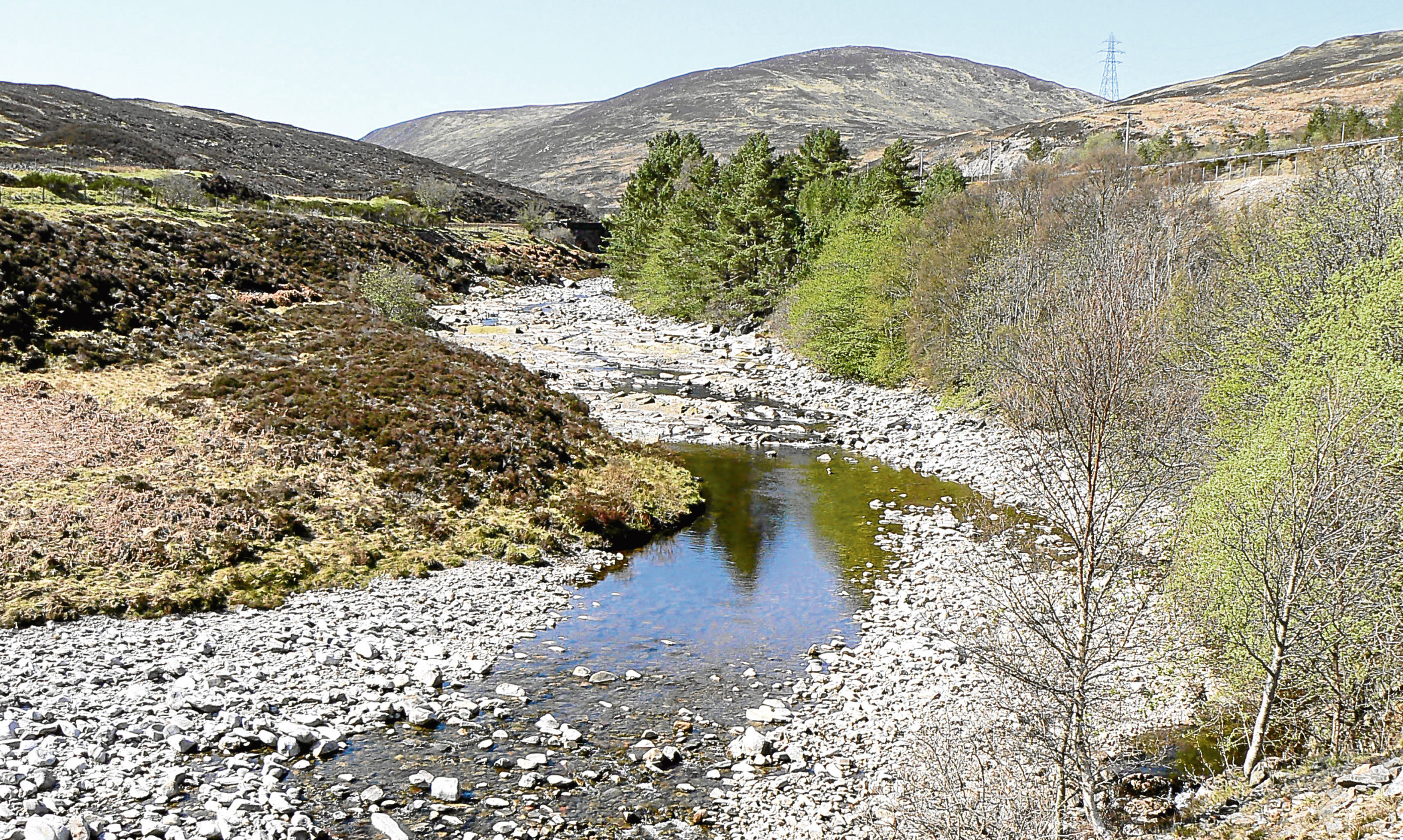 The dried-up bed of the River Garry in Perthshire, a tributary of the Tay.