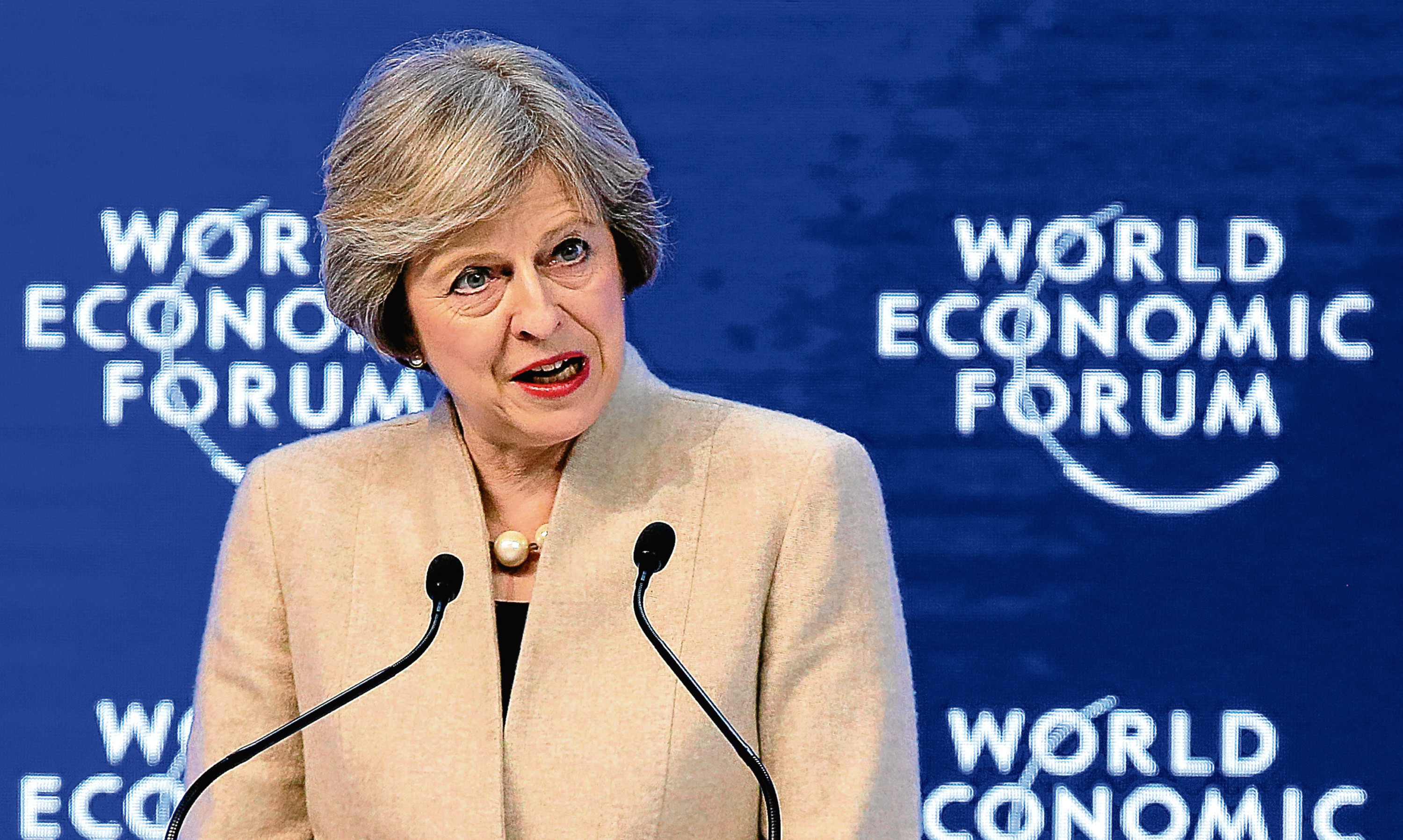 Prime Minister Theresa May addresses leaders at the World Economic Forum in Davos