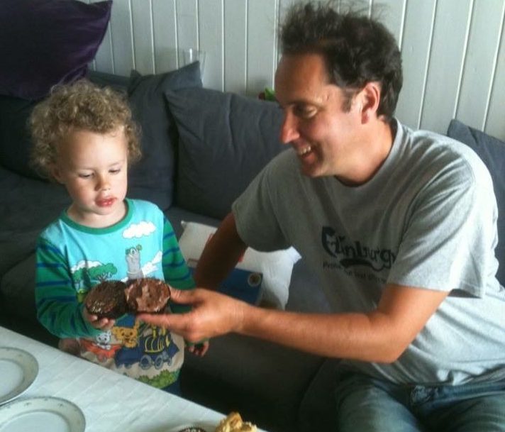 Brett feeding his son Leon in Norway