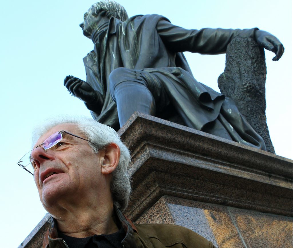 Dundee University Scottish history Professor Chris Whatley beside the statue of Robert Burns in Dundee. 