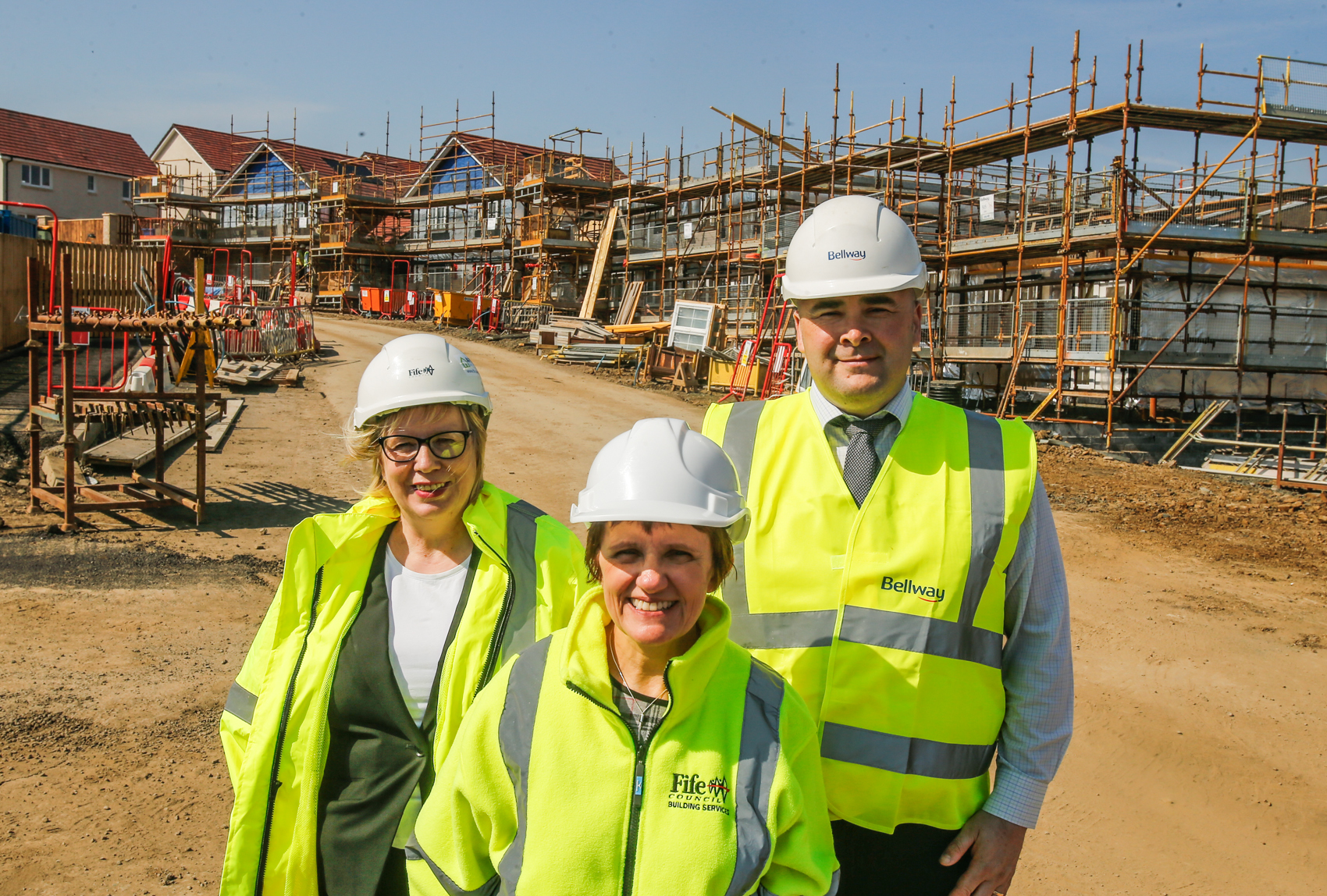 Councillor Judy Hamilton (front) with Louise Sutherland from Fife Council and David Leaf from Bellway Homes Scotland at the site of an affordable housing development in Cowdenbeath.