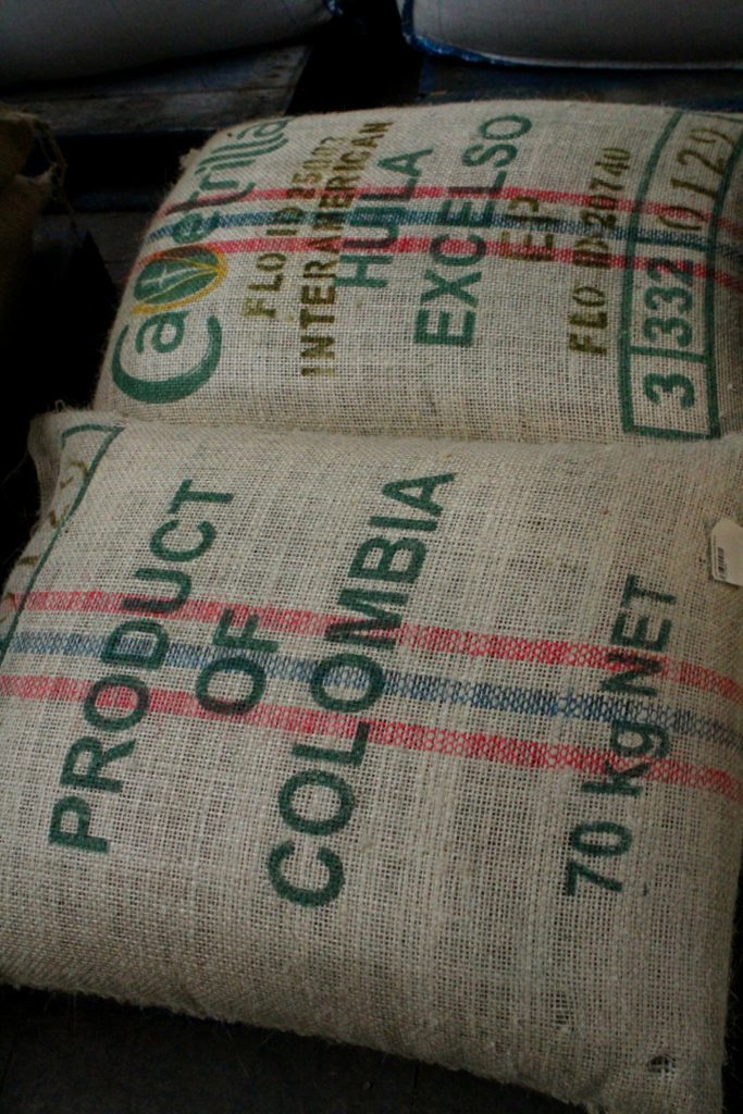 Some of the sacks of coffee from all over the world in the raw storage area at James Aimer coffee merchants.