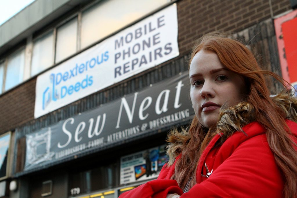 Jaye Hudson outside the Dexterous Deeds shop in Lochee High Street.