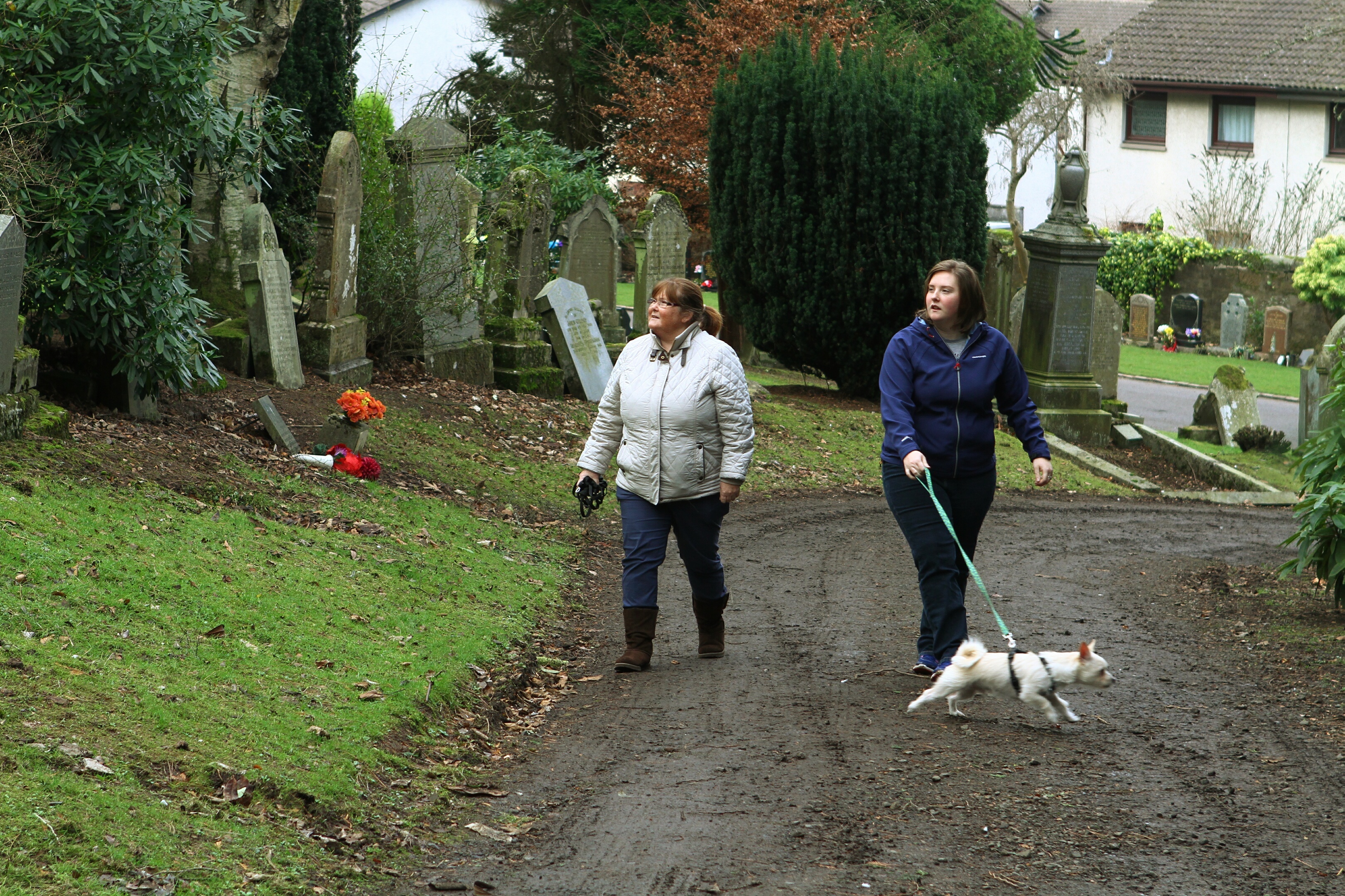 Helen Howie, left, and Ailsa Howie, with their dog Angus, helping in the search for Bella.