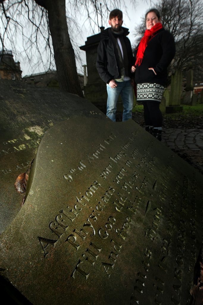 Stewart Heaton and Louise Murphy of Dark Dundee tours in the Howff cemetery.