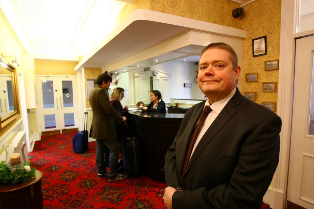 General Manager Brian Wishart in the newly reopened hotel reception.