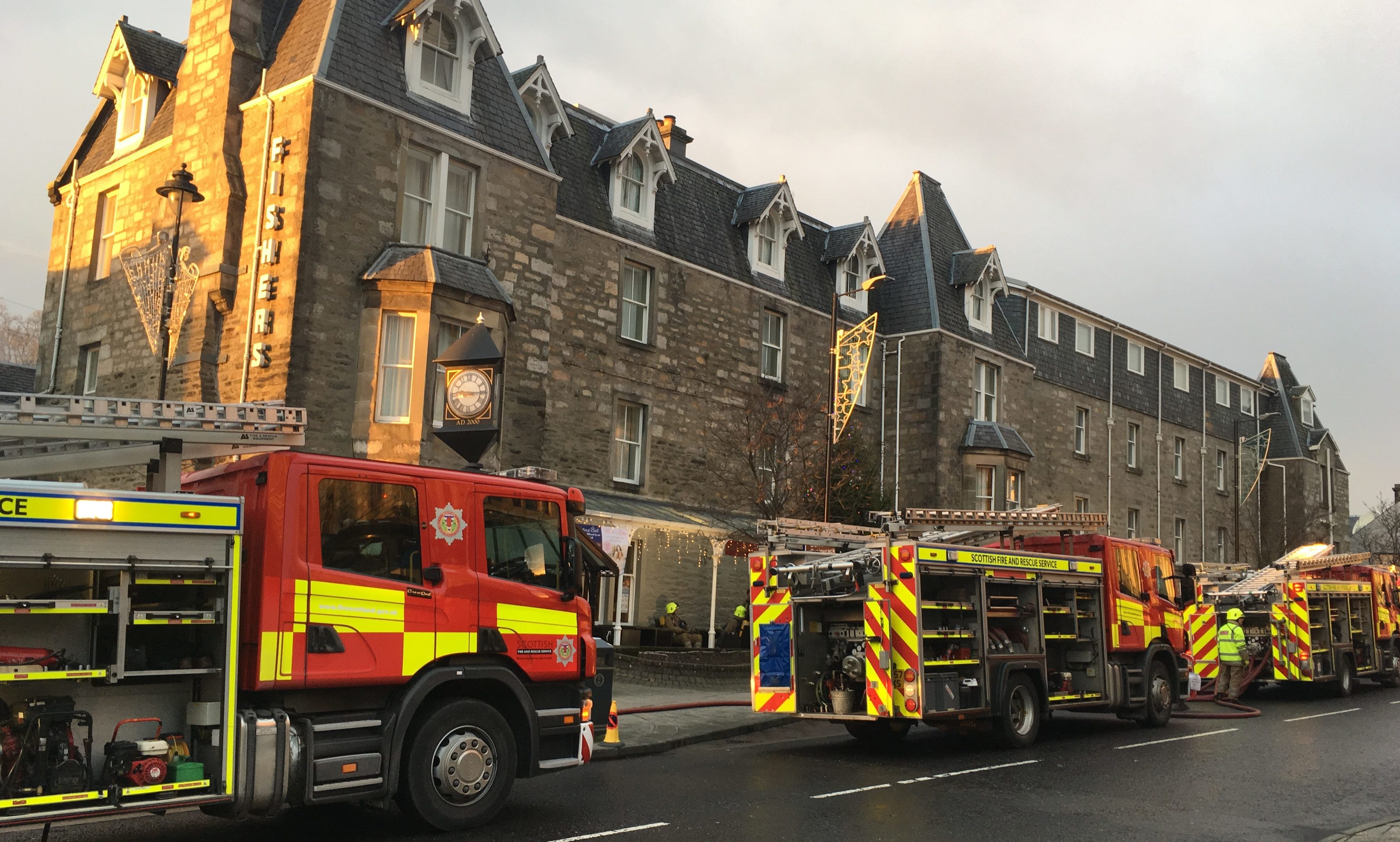 Fire crews outside Fishers on New Year's morning.