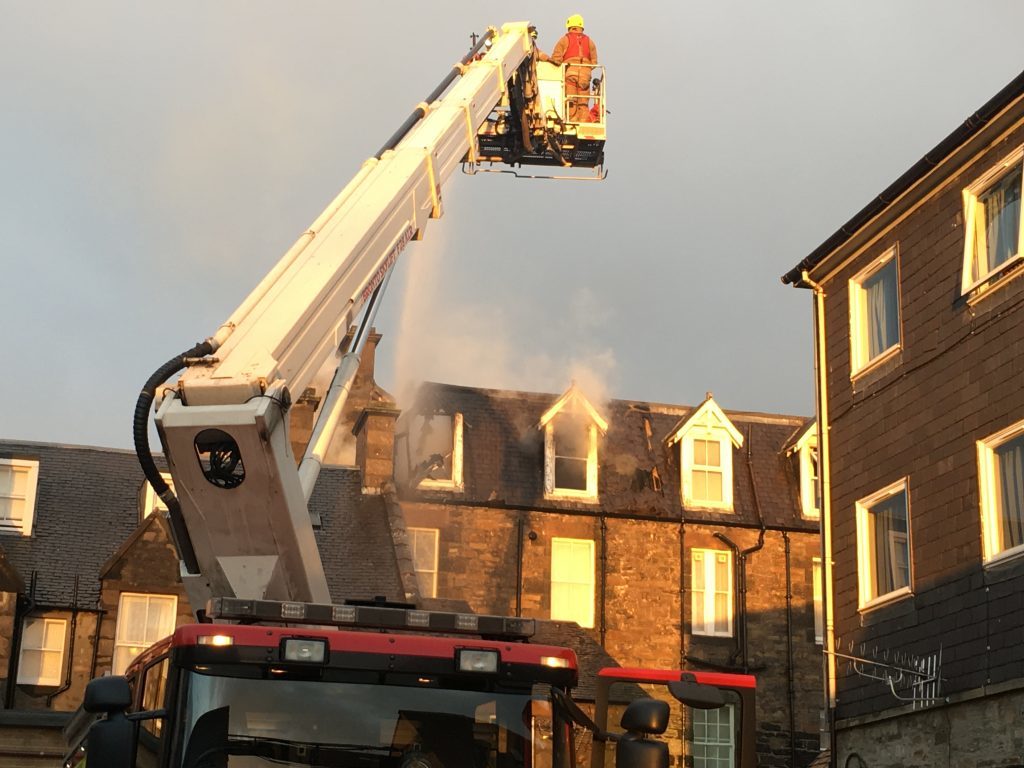 An aerial pump is used to tackle the blaze.