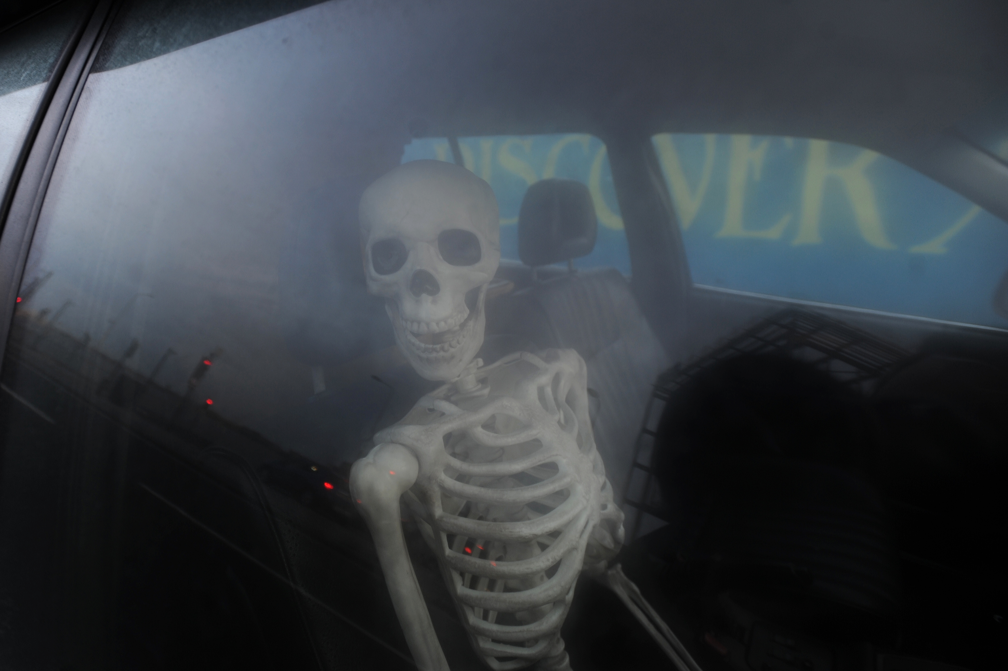 The hearse contains a mock skeleton.