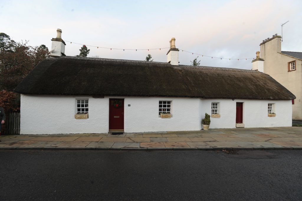 Ian's thatched cottage in Glamis.
