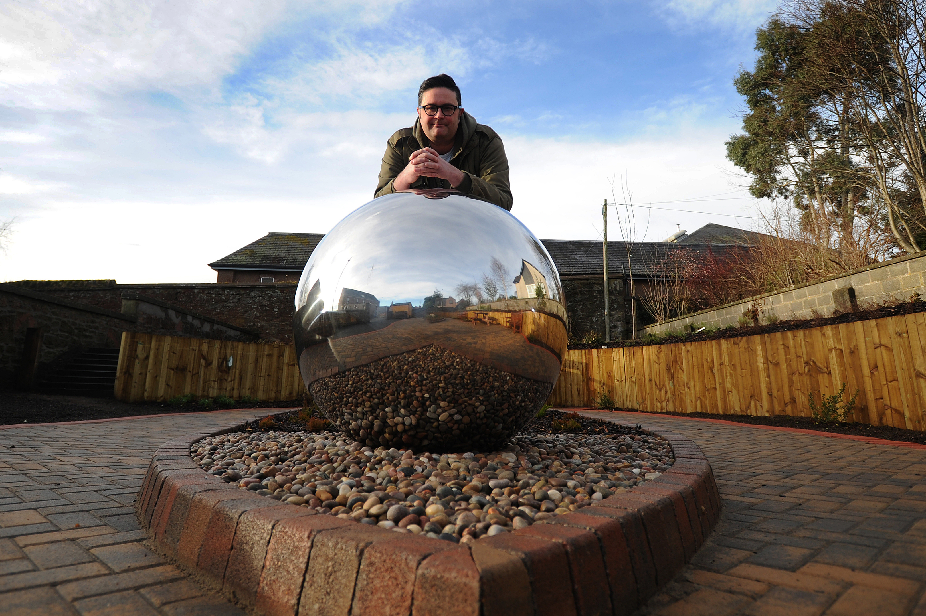 Graham Galloway in the Kirrie Connections dementia garden. opened last year