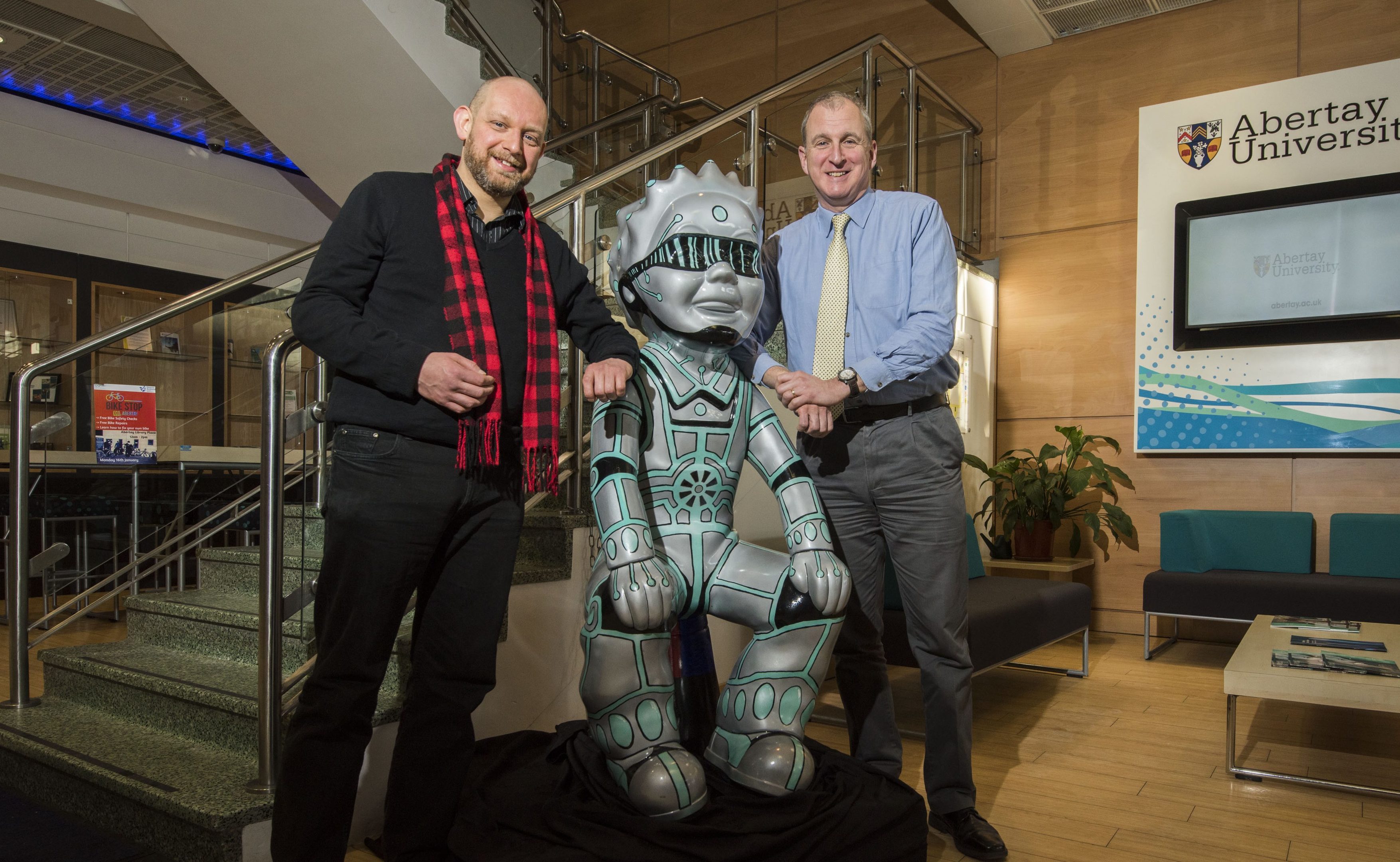 Artist David Marr visited his own Oor Wuillie in the reception at Abertay University with Principal Nigel Seaton.