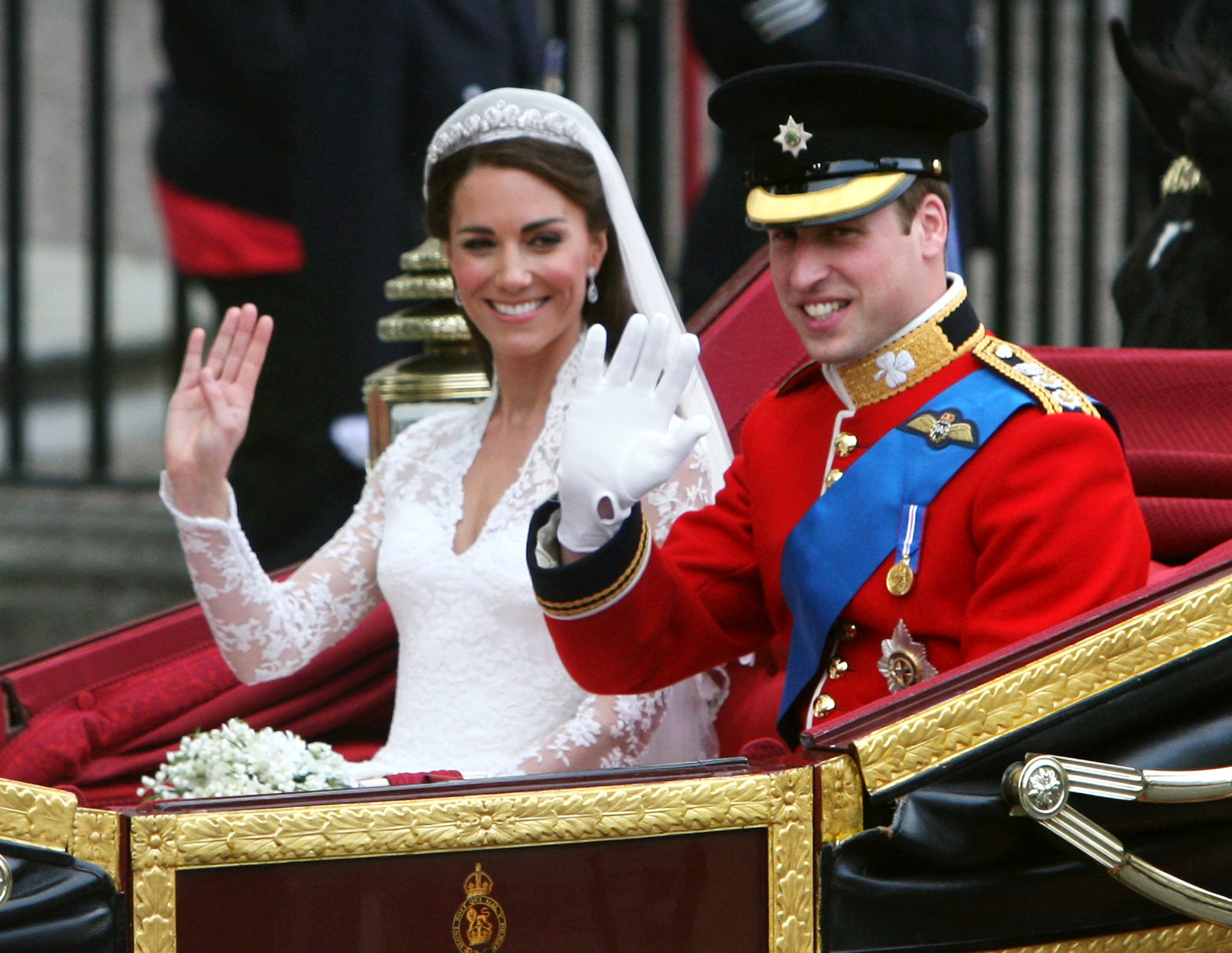 Prince William and his bride Kate leave Westminster Abbey in London as man and wife after their wedding.