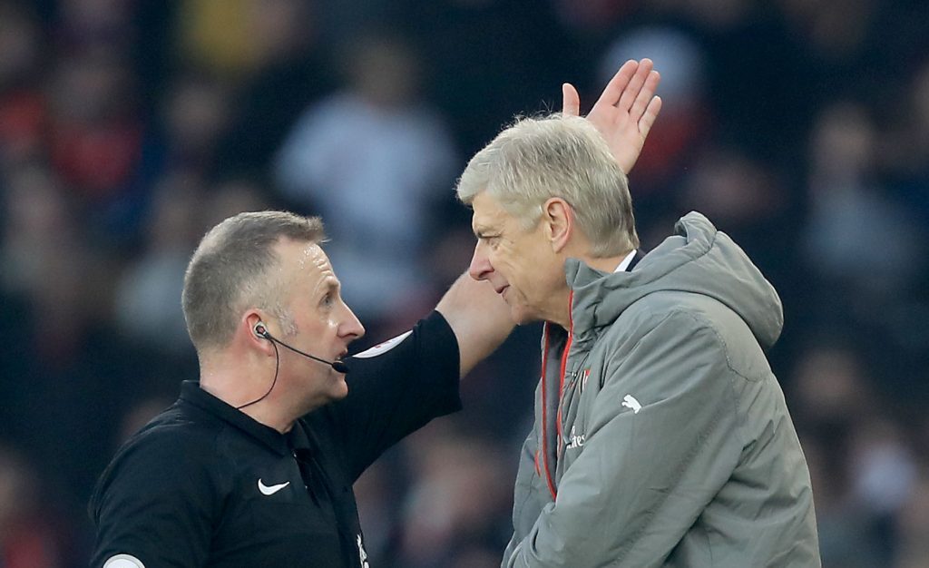 Referee Jonathan Moss has had enough of listening to Arsene Wenger.