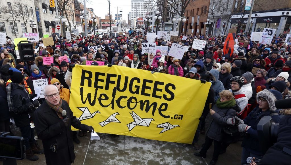 Thousands of people protest against the U.S. immigration policy of U.S. President Donald Trump, at the United States embassy in Ottawa, Canada, on January 30.