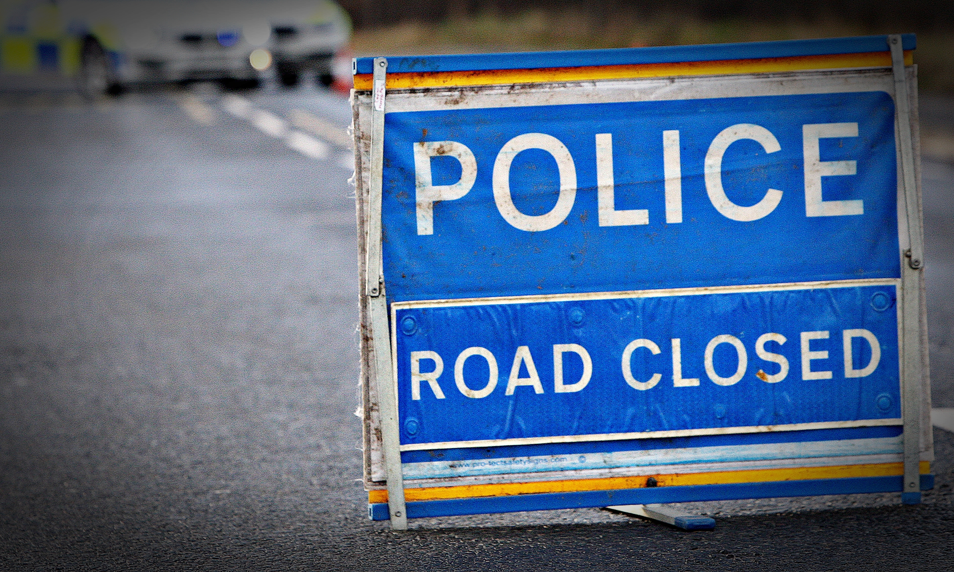 Stock police road closed sign