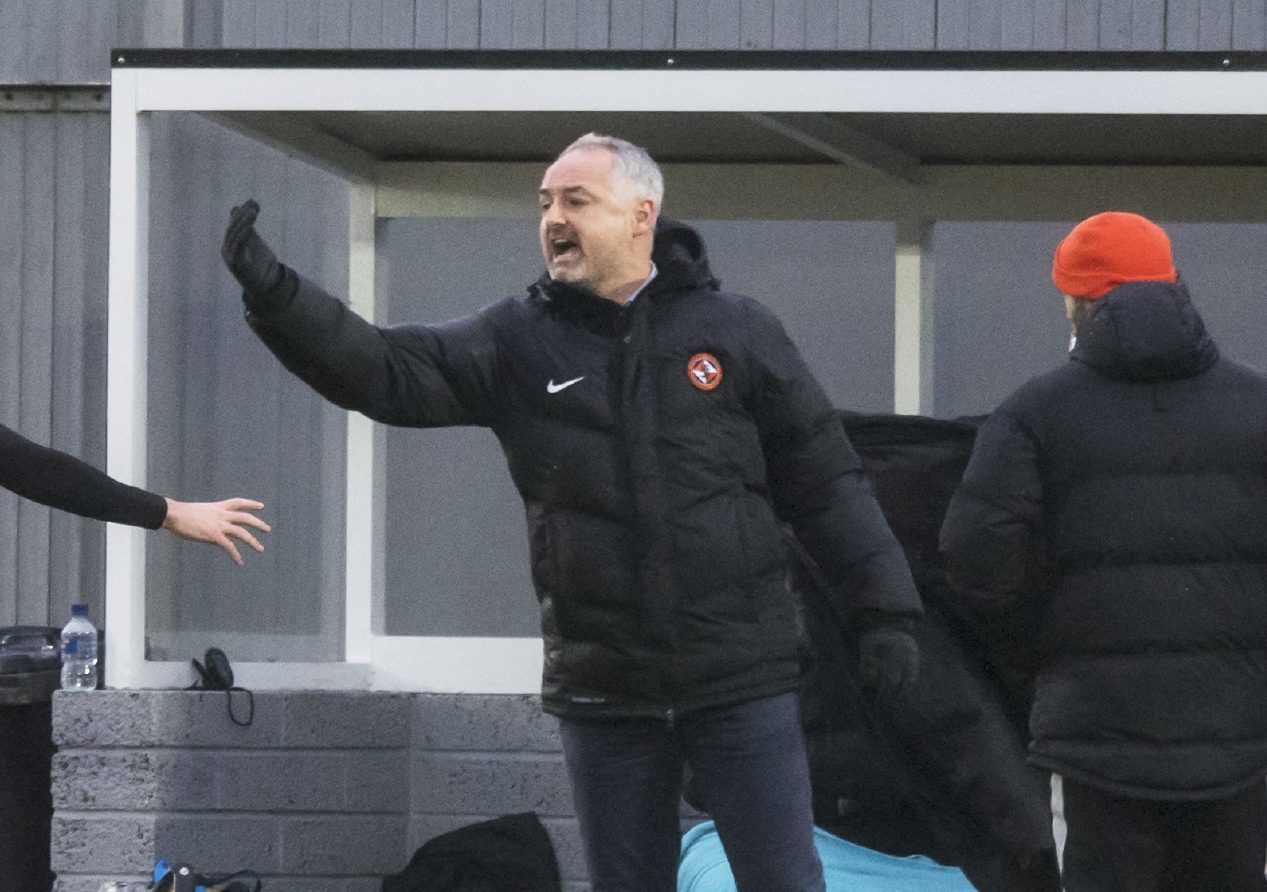 United boss Ray McKinnon gives out instructions.