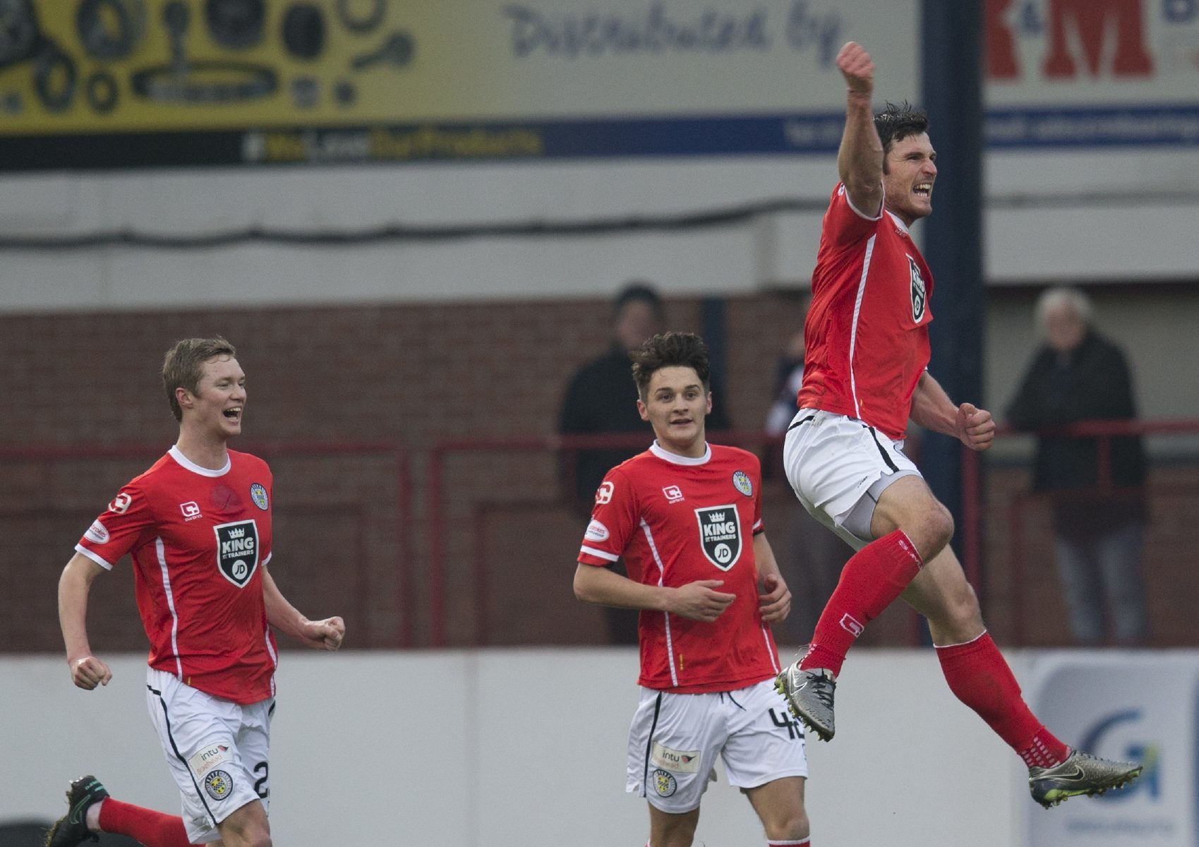 St Mirren striker John Sutton celebrates after opening the scoring against Dundee.