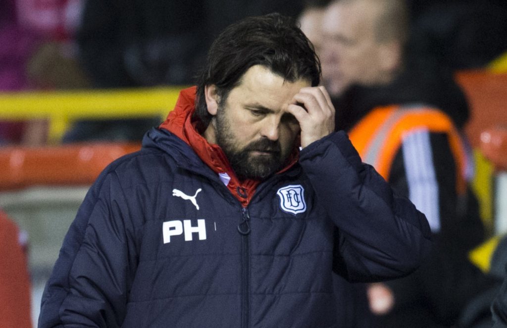 27/01/17 LADBROKES PREMIERSHIP ABERDEEN V DUNDEE PITTODRIE - ABERDEEN Dundee manager Paul Hartley cuts a dejected figure