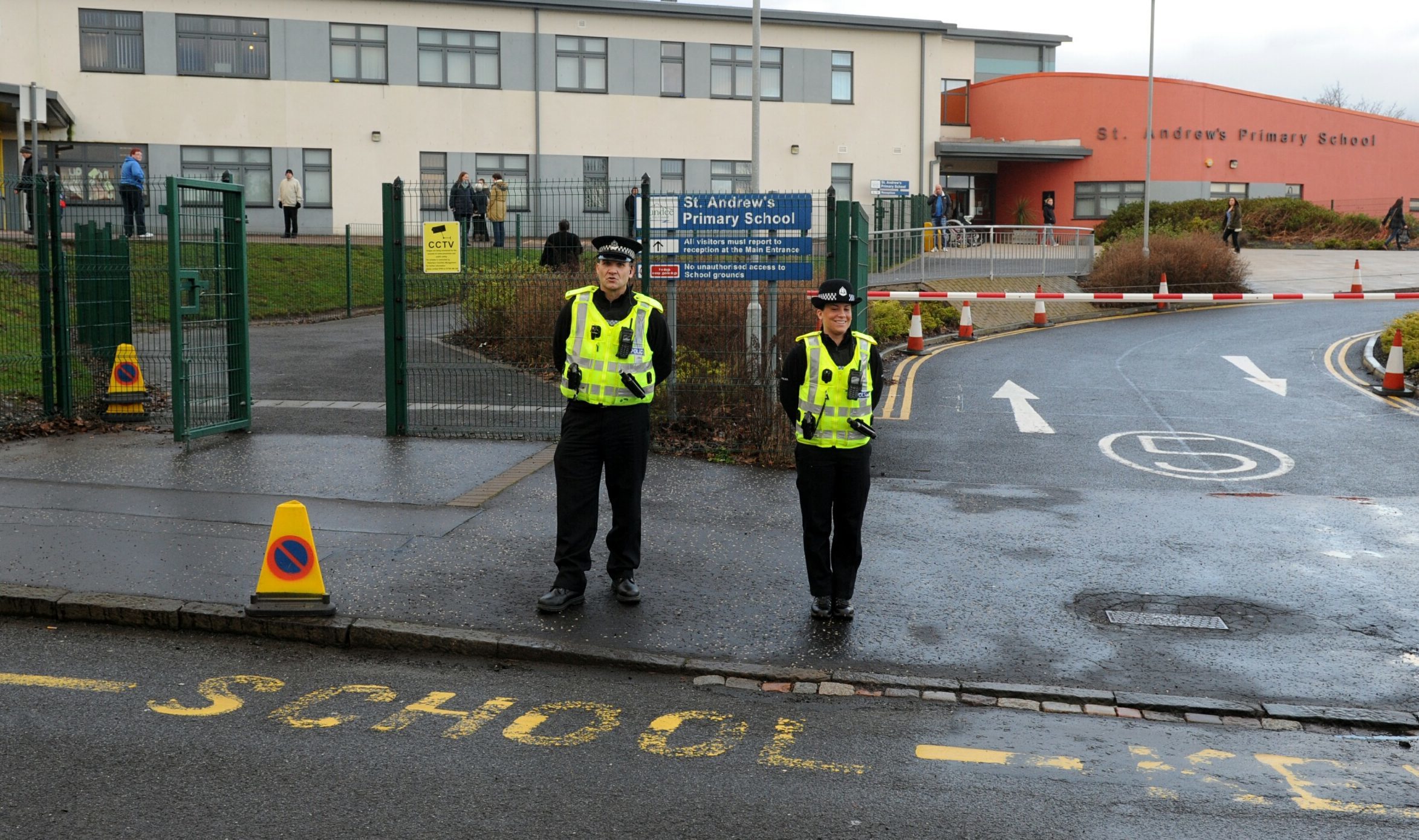 Police monitor parking outside St Andrews Primary.