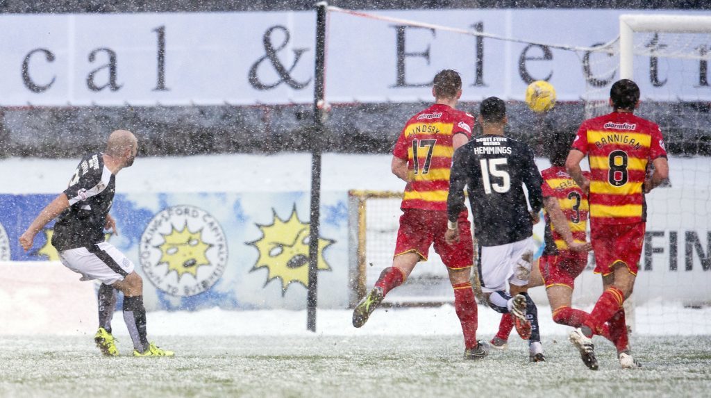 Gary Harkins gives Dundee a 4-1 lead at Firhill a year ago.