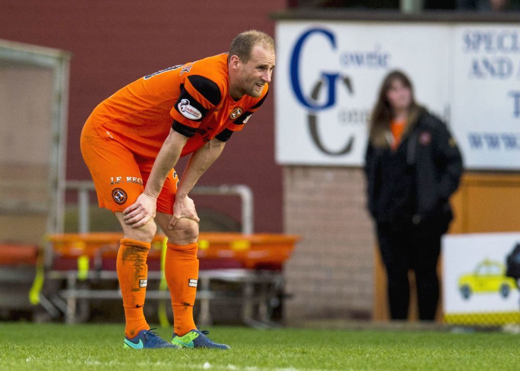 Dundee United's Frank Van Der Struijk does not look too happy with a draw against Morton.