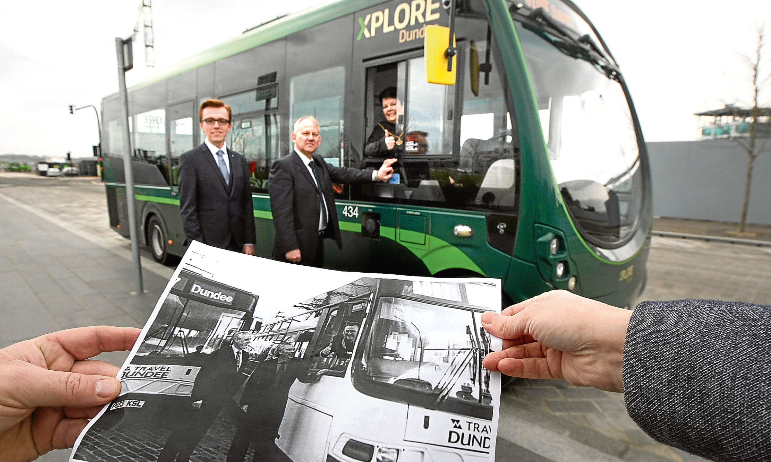 Then and now: Depute Lord Provost Christina Roberts and Xplore Dundee managers Frank Sheach and Marc Winsland this week  recreated a 1997 photograph marking the sale of Tayside Buses to National Express.