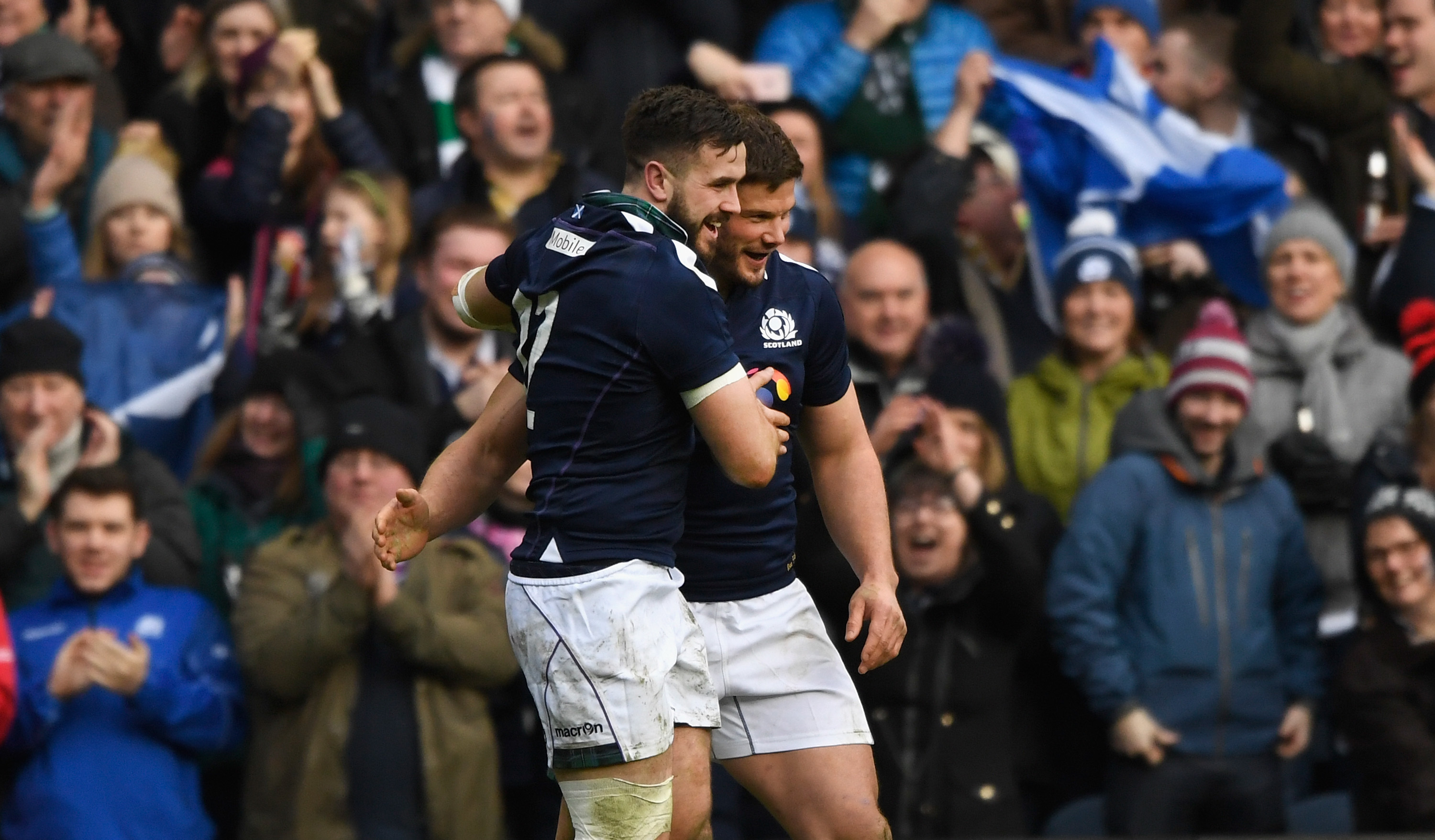 Alex Dunbar and Ross Ford congratulate each other after combibing for the centre's surprise lineout try against Ireland.