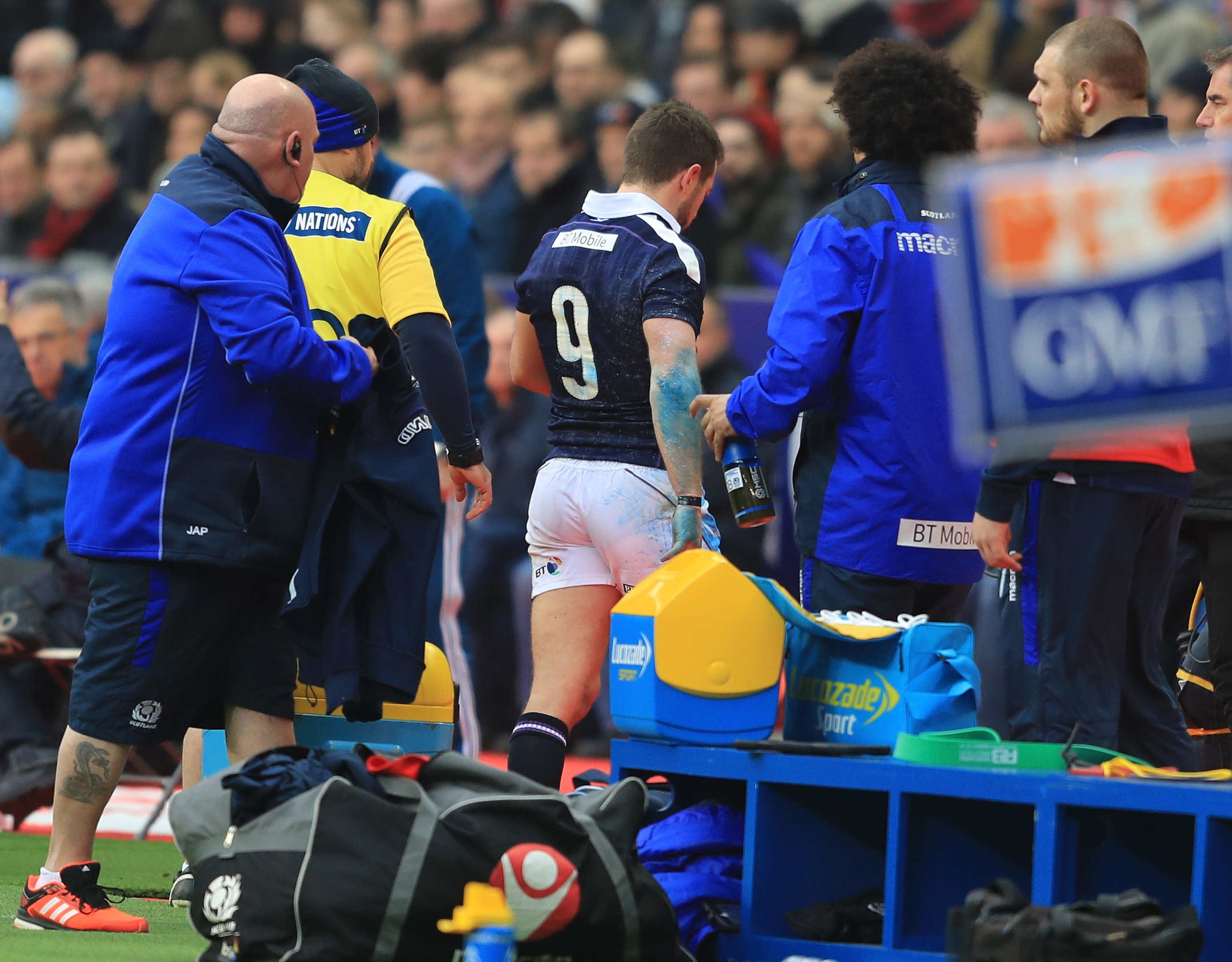 Laidlaw leaves the pitch in Paris after suffering his ankle injury.