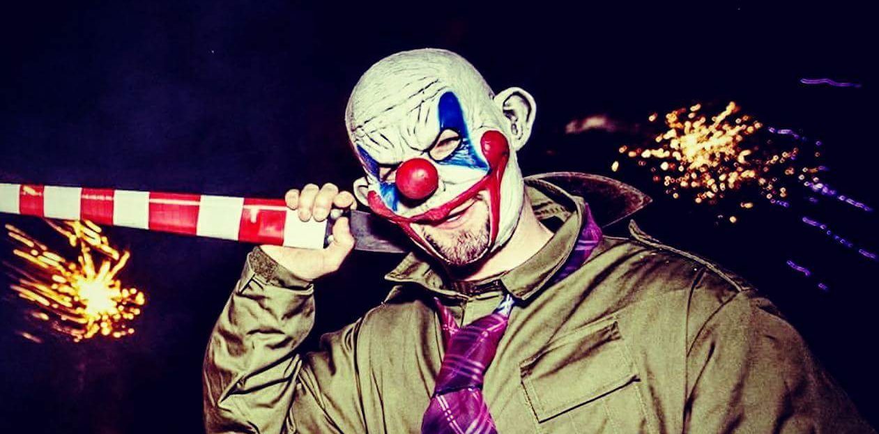 One of the actors dressed as a creepy clown in preparation for the event.