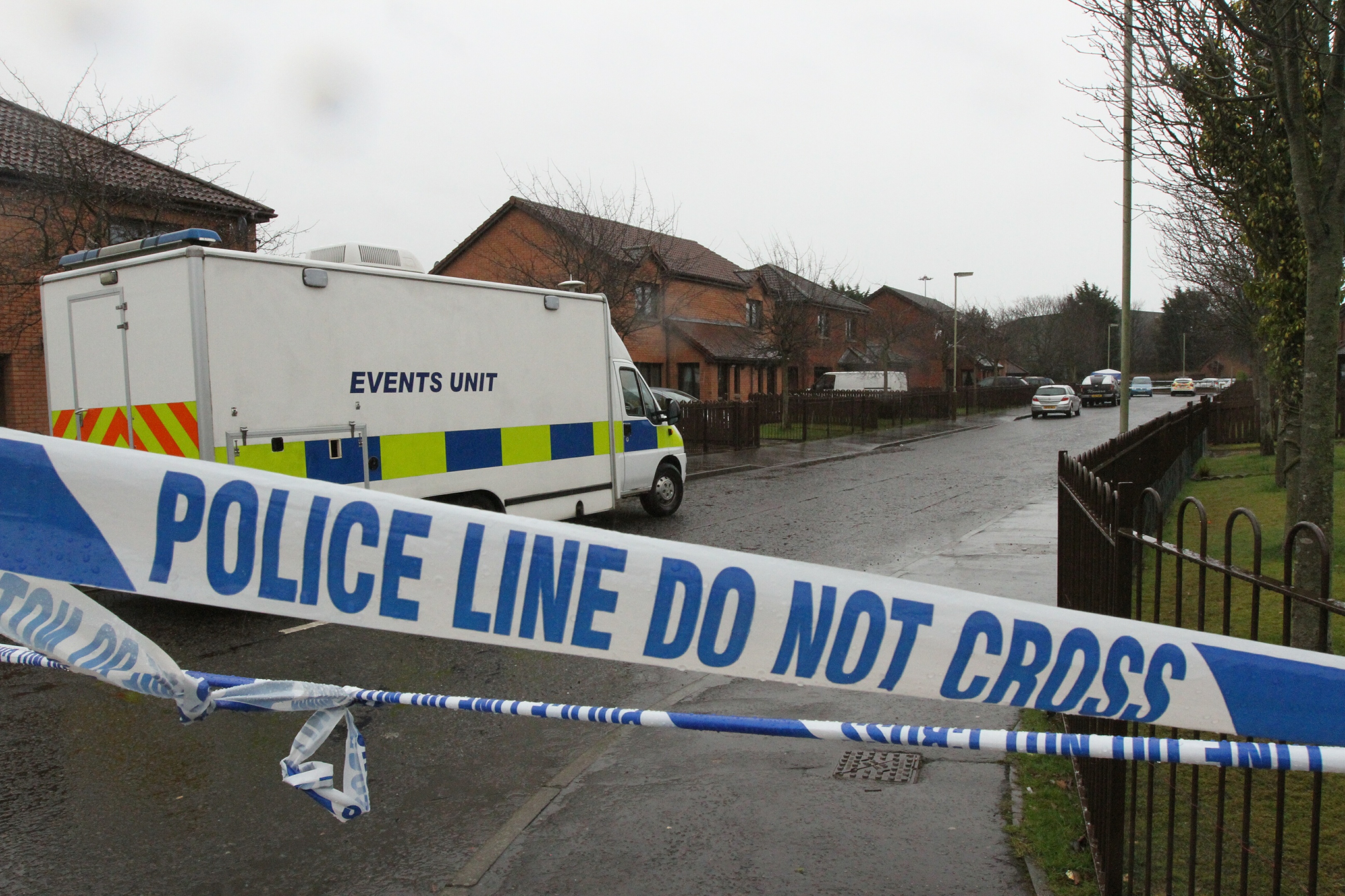 The scene at Drumlanrig Drive shortly after the alleged murders.