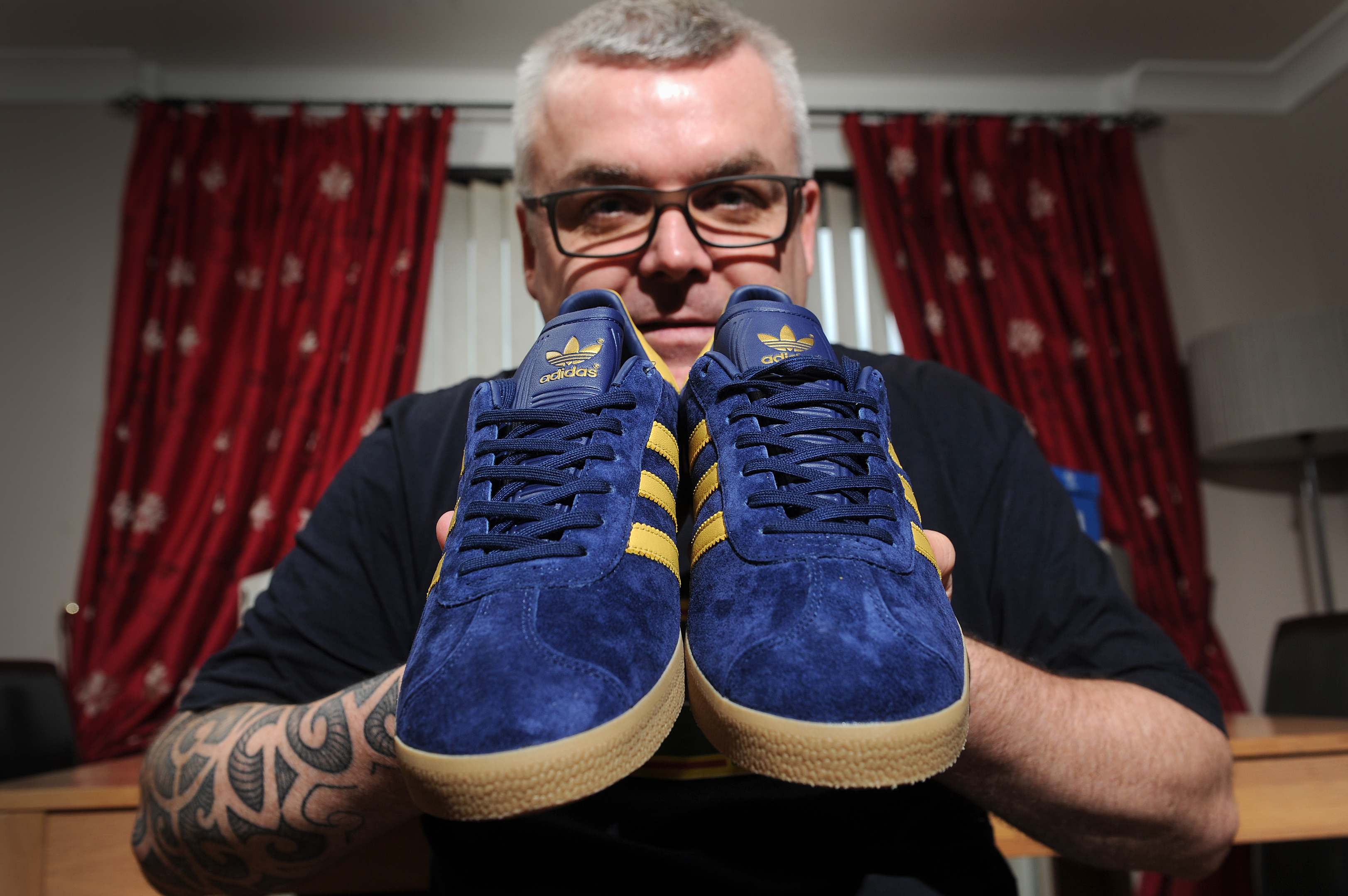 Alan Stewart with the trainers he has just added to his collection.