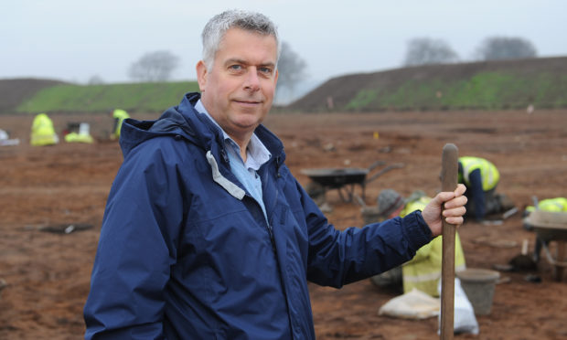 Councillor Boyd at the dig site.