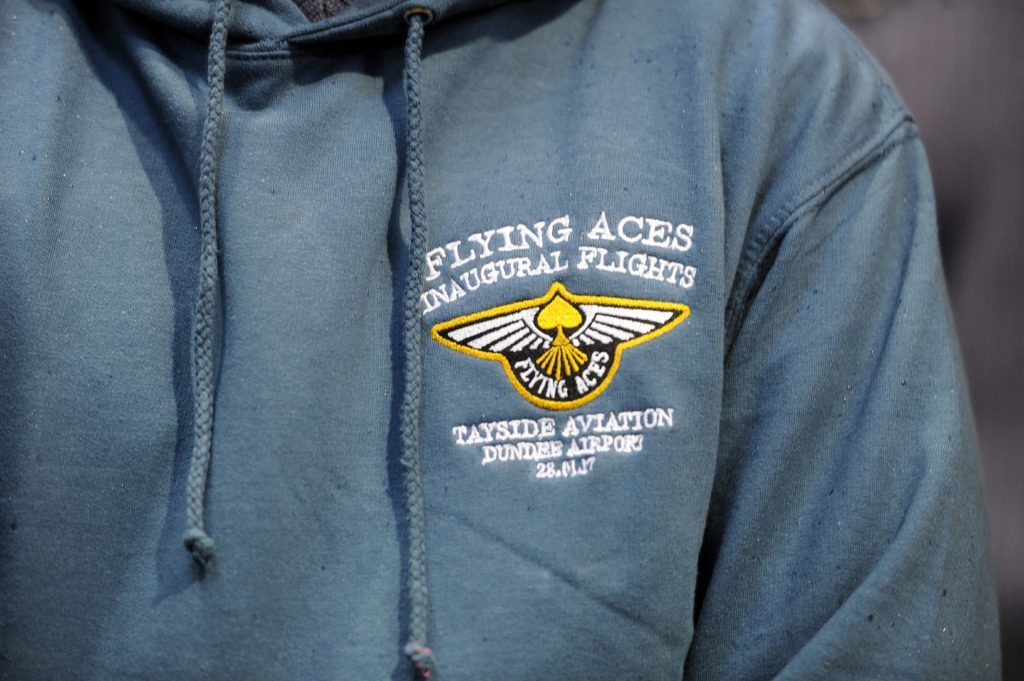 Detail of the Flying Aces logo design on a sweatshirt.