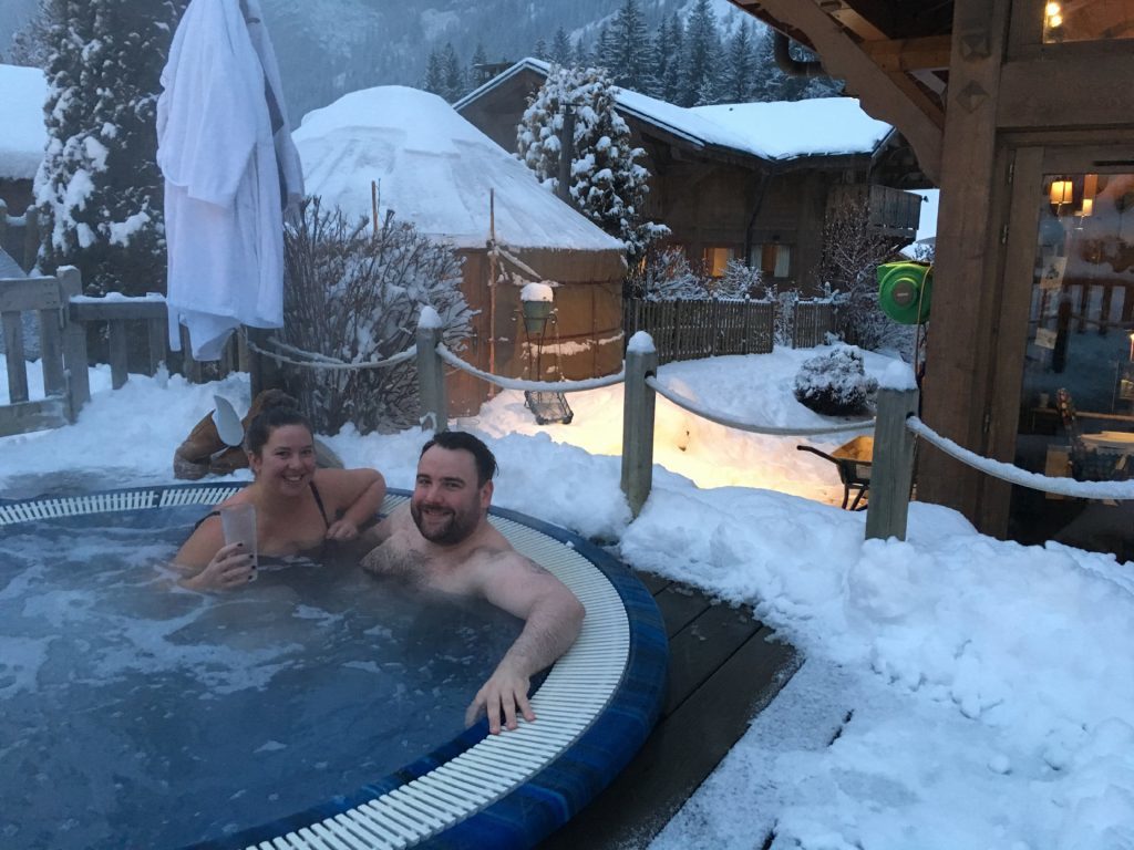 Paul and Louise enjoying their hot tub after a day on the slopes.