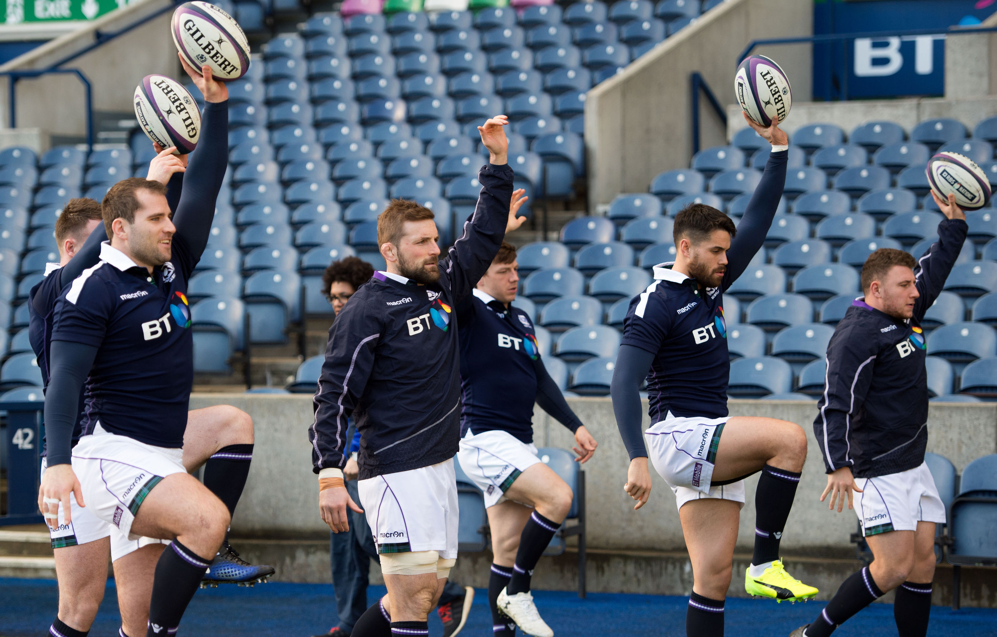 Fraser Brown (left) leads Scotland's warm up in the captain's run at Murrayfield Stadium