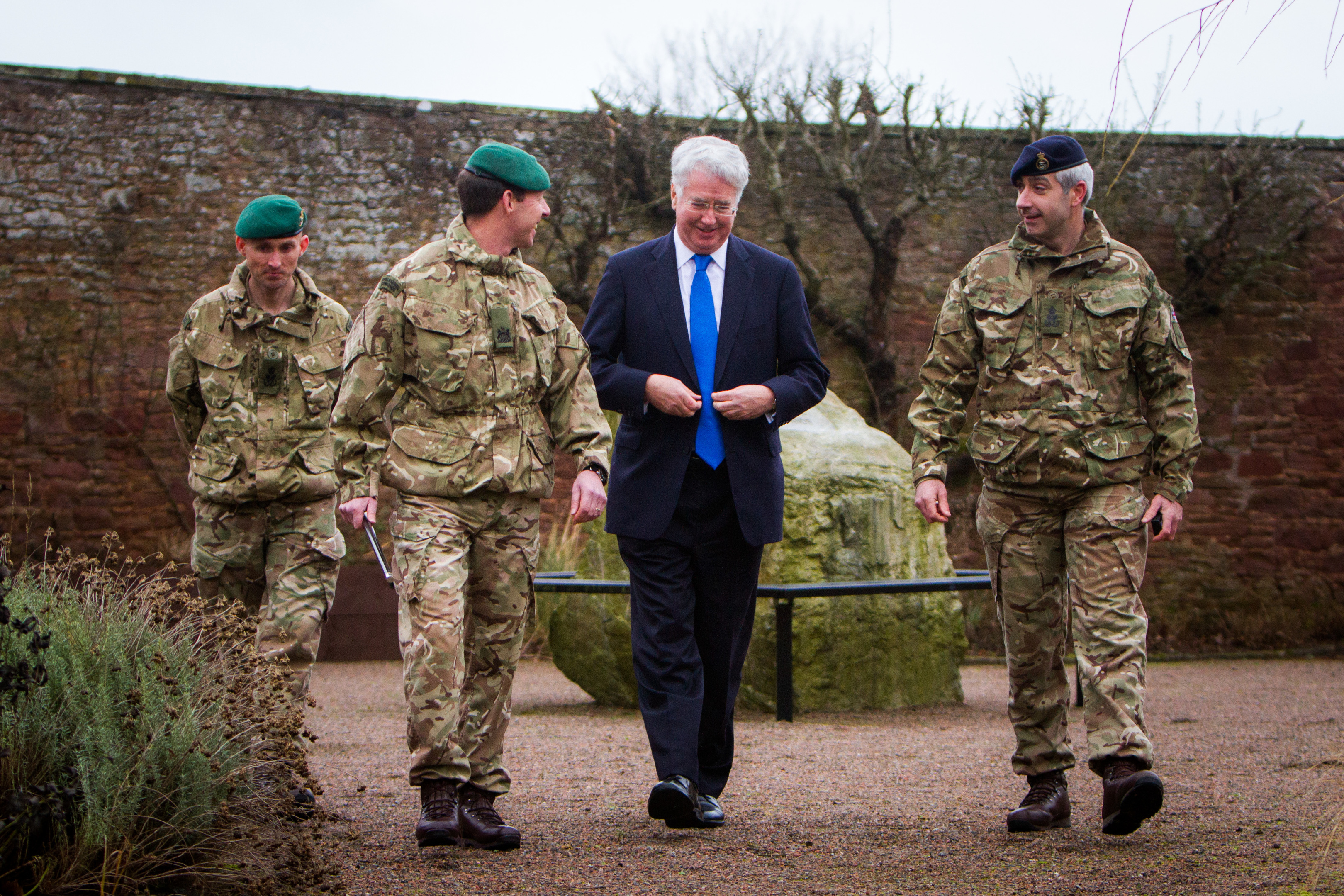 Secretary of State for Defence Sir Michael Fallon alongside PO Jamie Jackson (left), Regimental Lt Sgt Maj WOI Wilson and PO Ian Dixon (right) at RM Condor, Arbroath.