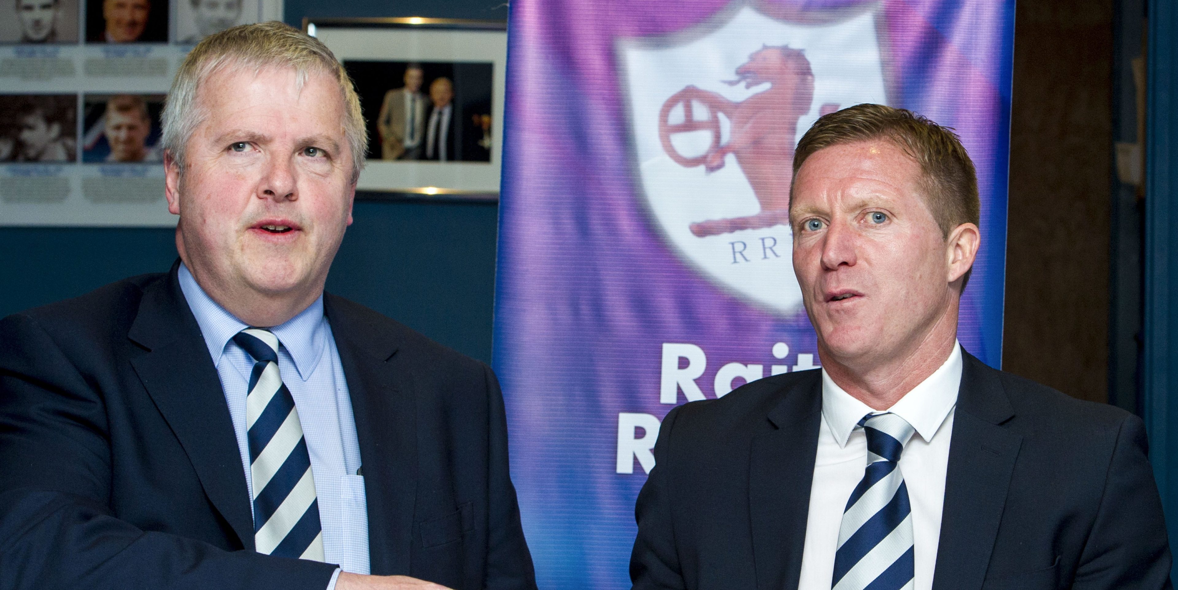 Eric Drysdale, left, with Gary Locke after he was appointed boss last May.