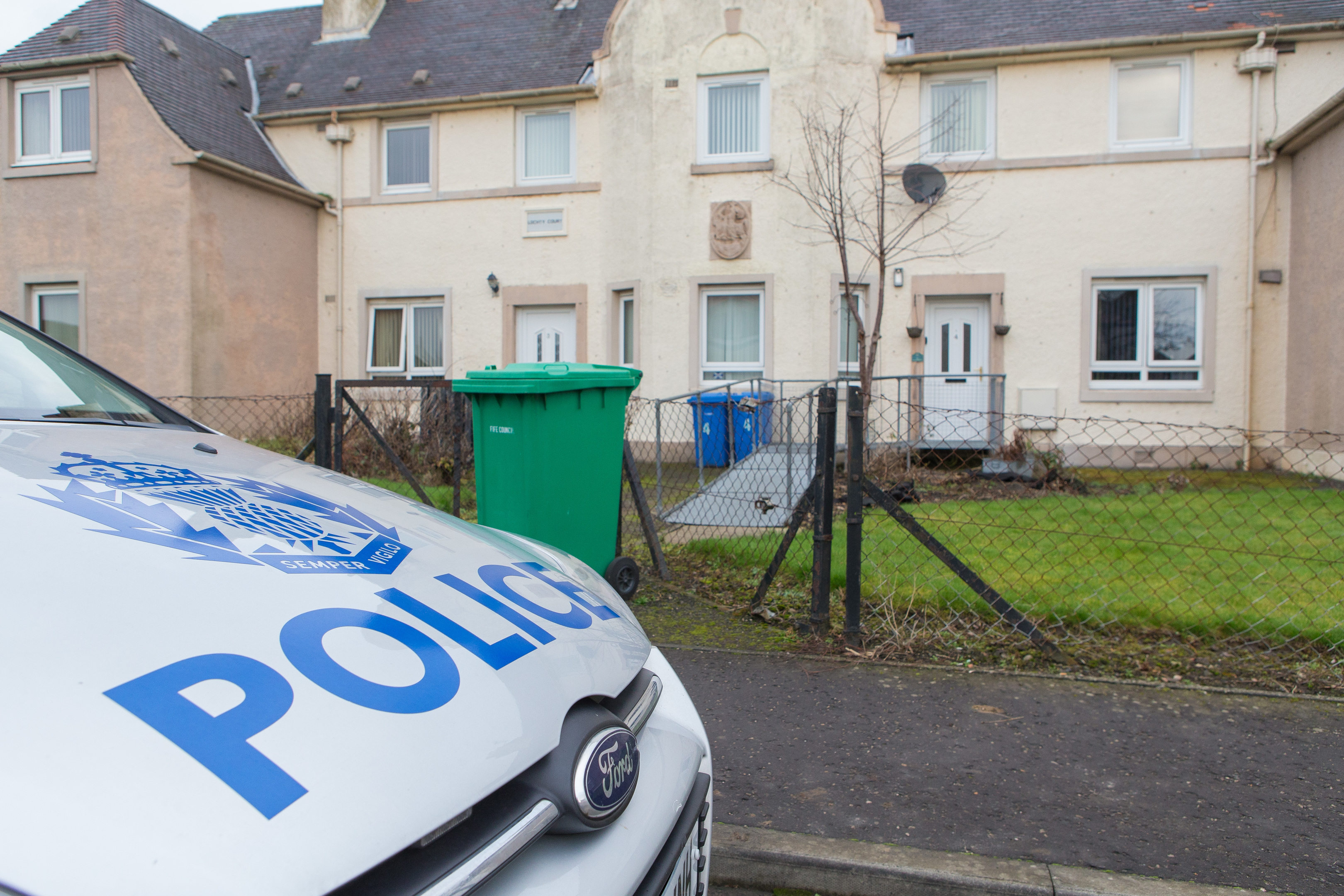 Police remain at the Thornton flat where the 39-year-old woman died