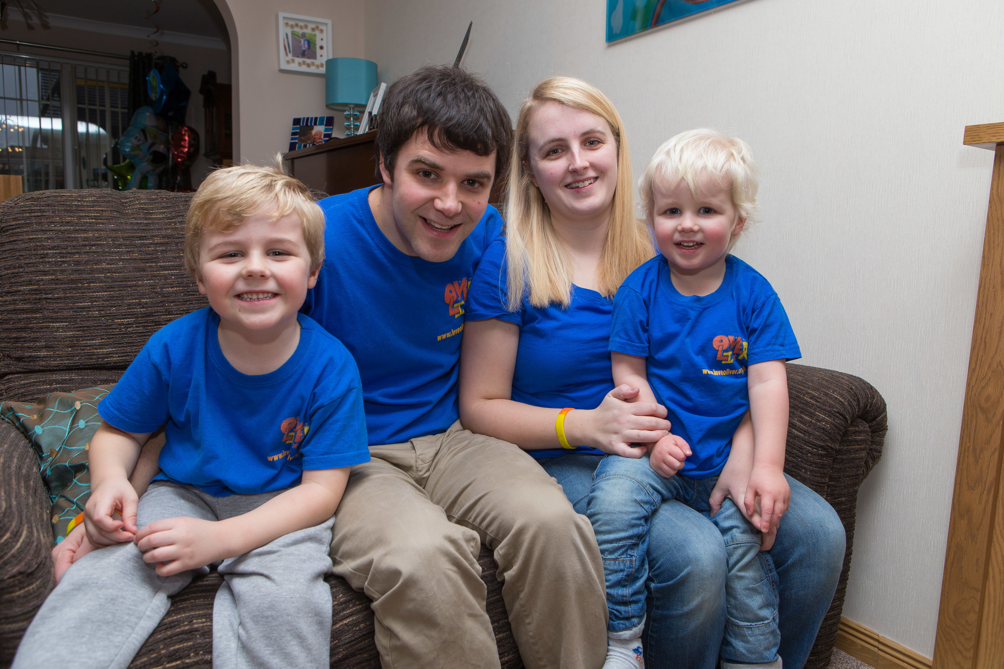 Pictured from left Micah, 5, Andy Gill, 32, Jennifer Gill, 31, and Rory, 2.