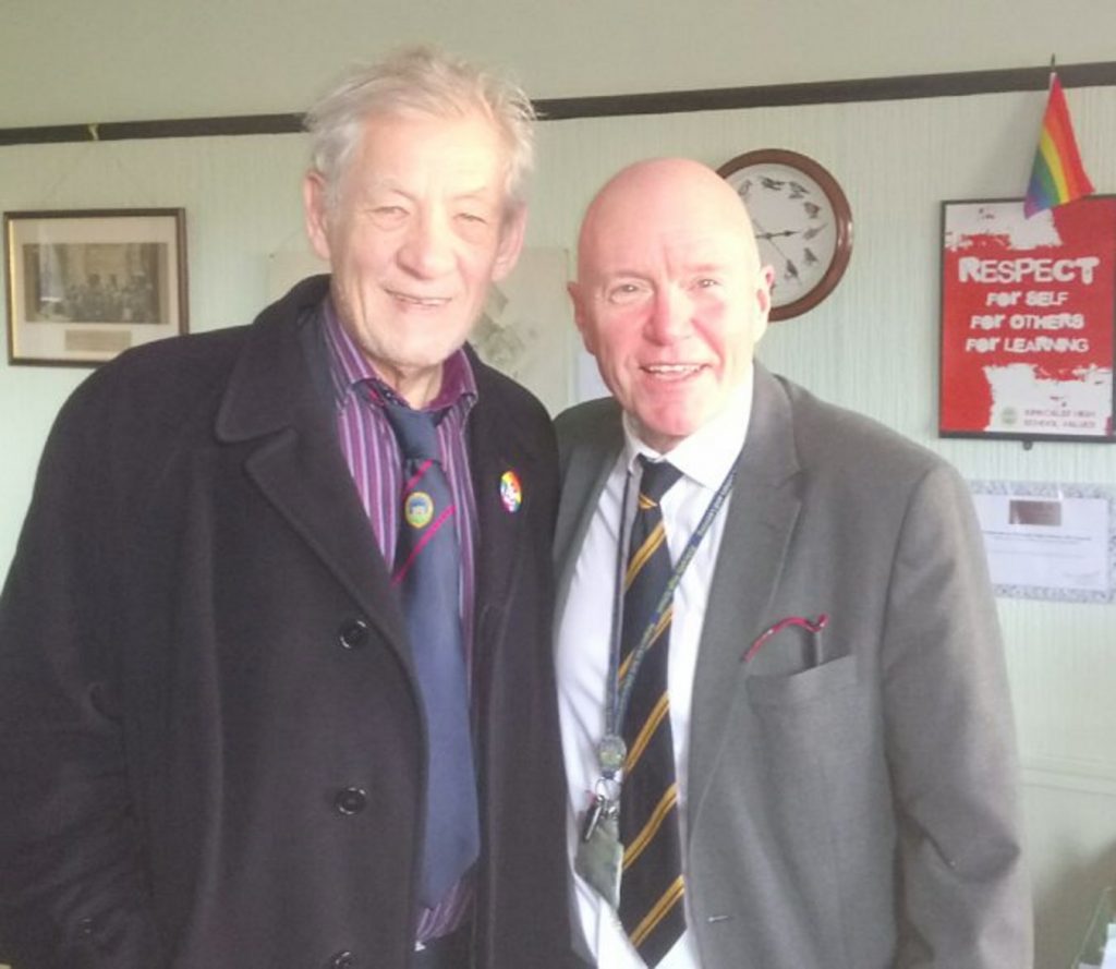 Sir Ian, sporting a KHS tie, with rector Derek Allan.