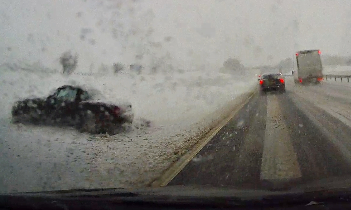 One of the many cars abandoned beside the M90 due to Storm Doris snow.