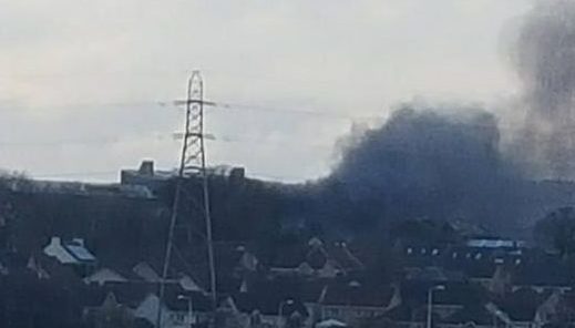 A huge plume of black smoke can be seen coming from South Fod Farm