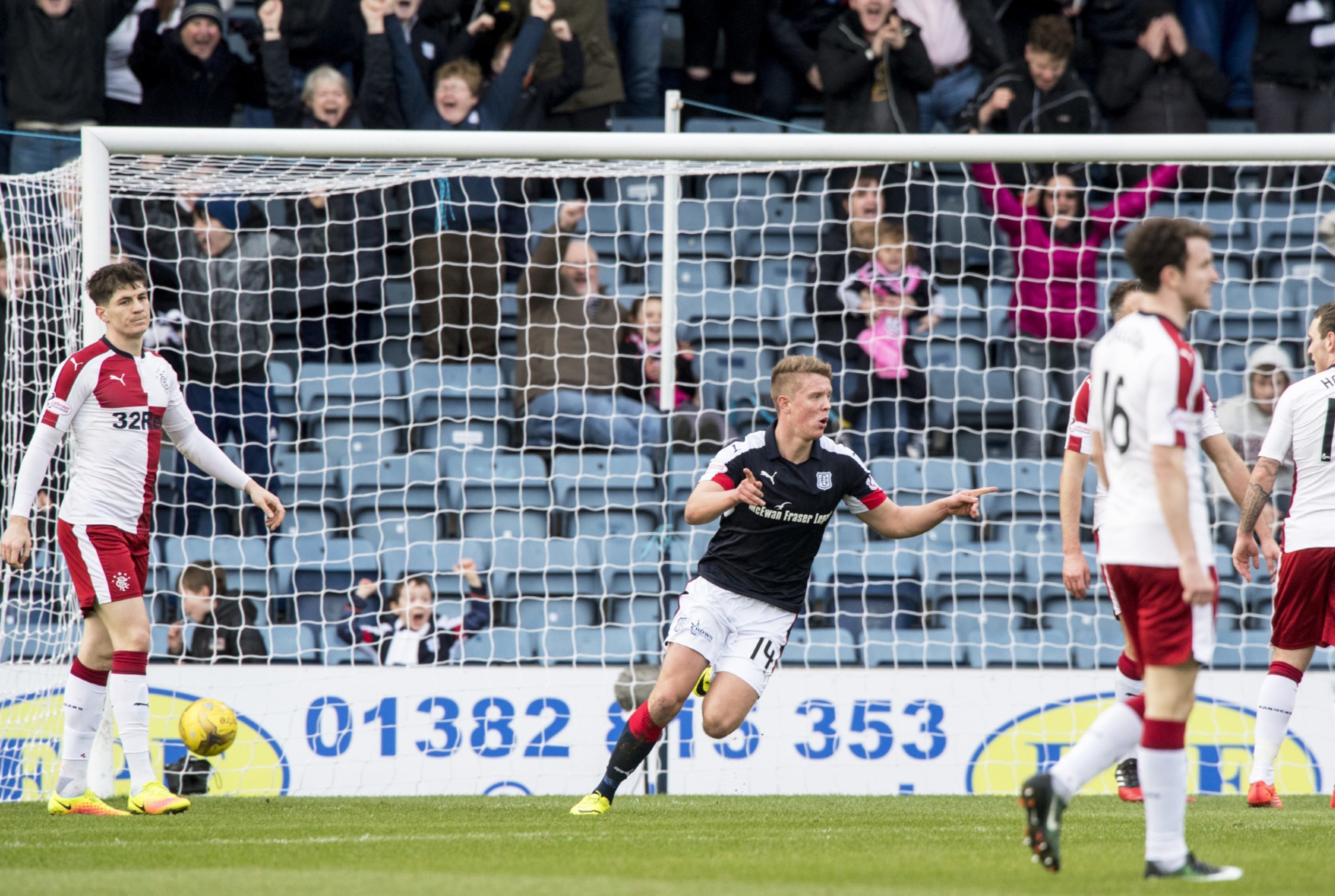 Mark O'Hara celebrates opening the scoring for Dundee.