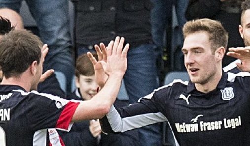 Dundee players celebrate after Kevin Holt scores their second.