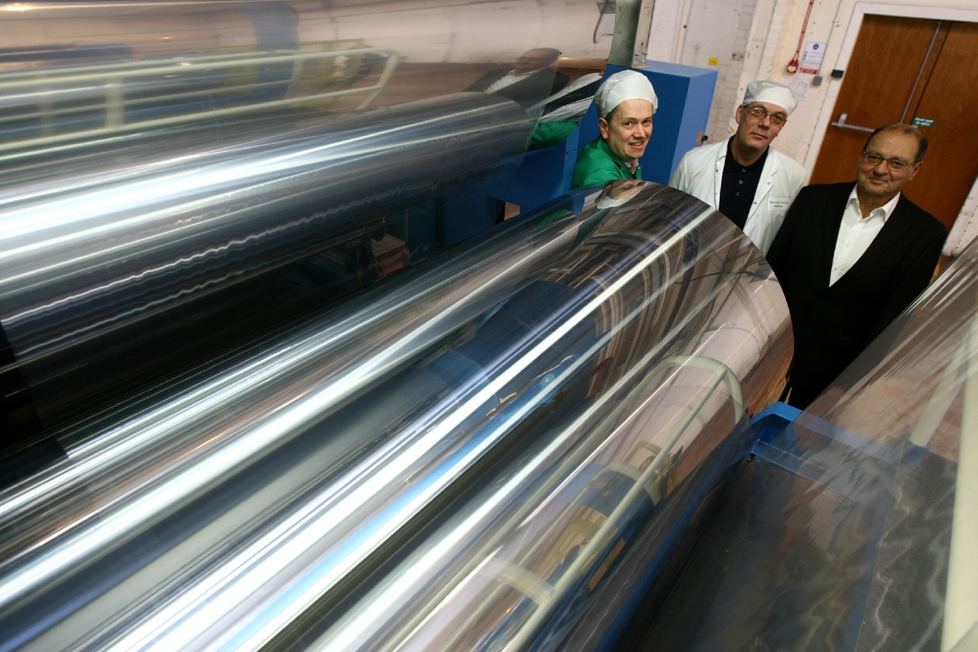 Andrew Woodward, project manager; Dave Wilson, technical manager, and Dr. Aziz Okhai at the Rockstar machine.