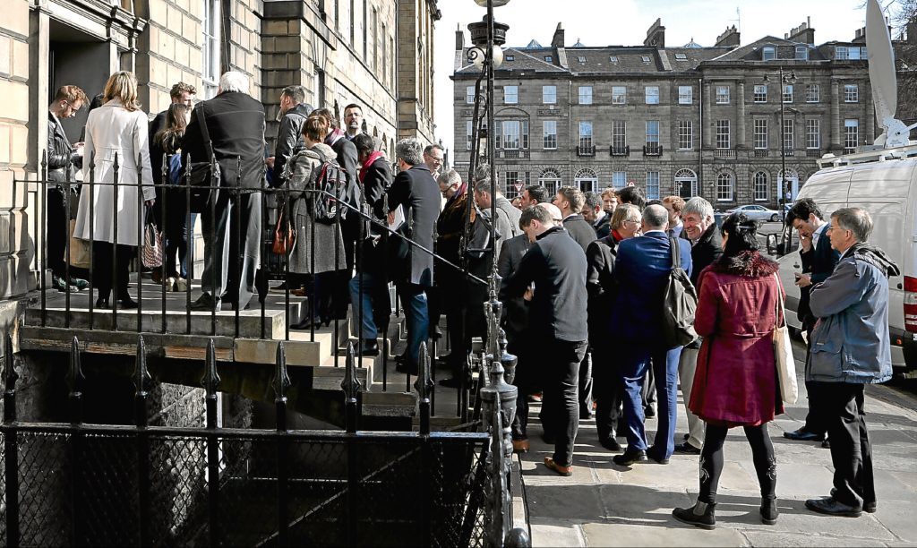 Media wait outside Bute House after Nicola Sturgeon said she will give Scots a "real choice" between Brexit and leaving the UK in a second vote on independence.