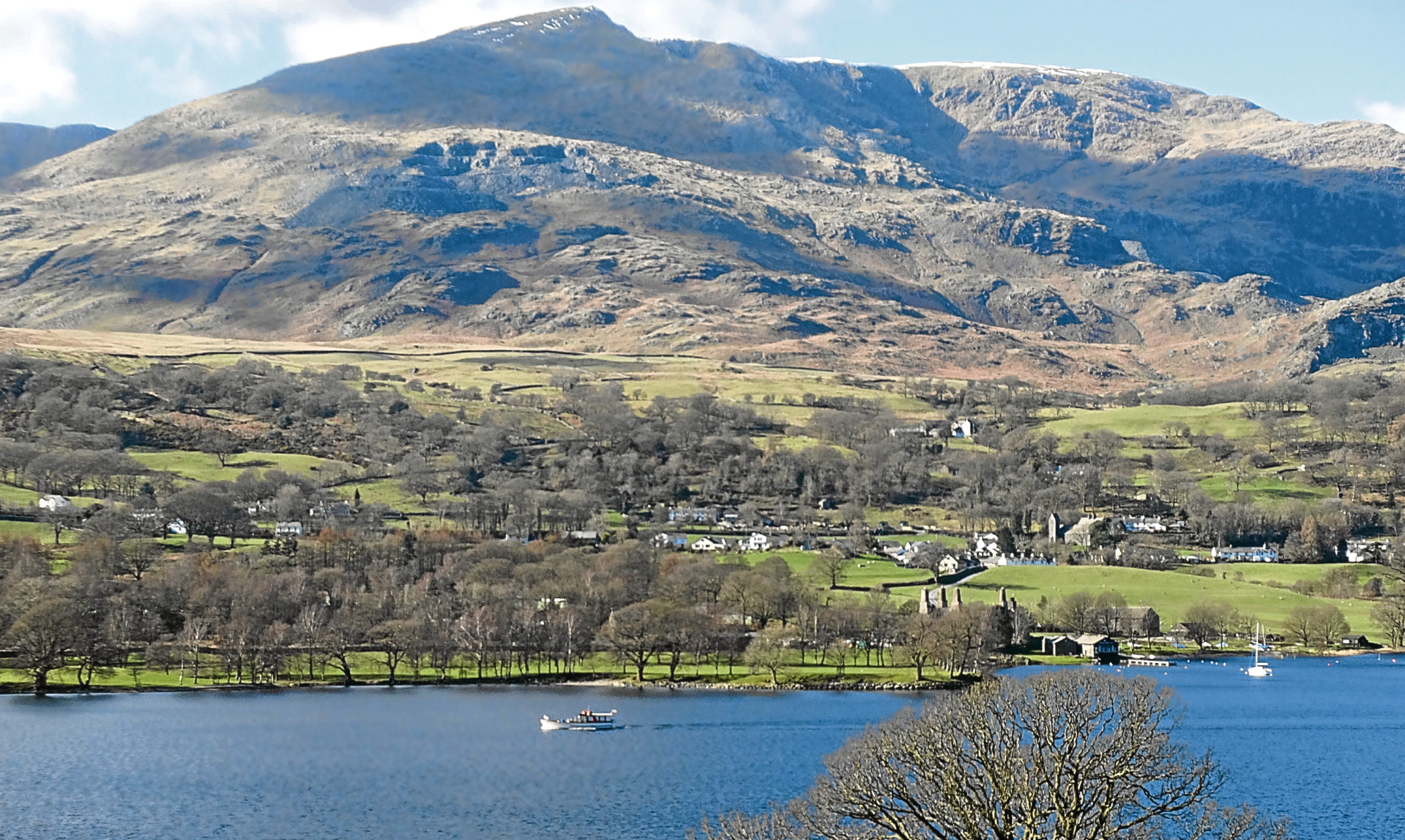 Coniston Old Man in the Lake District, with an eyebrow of snow along the summit.