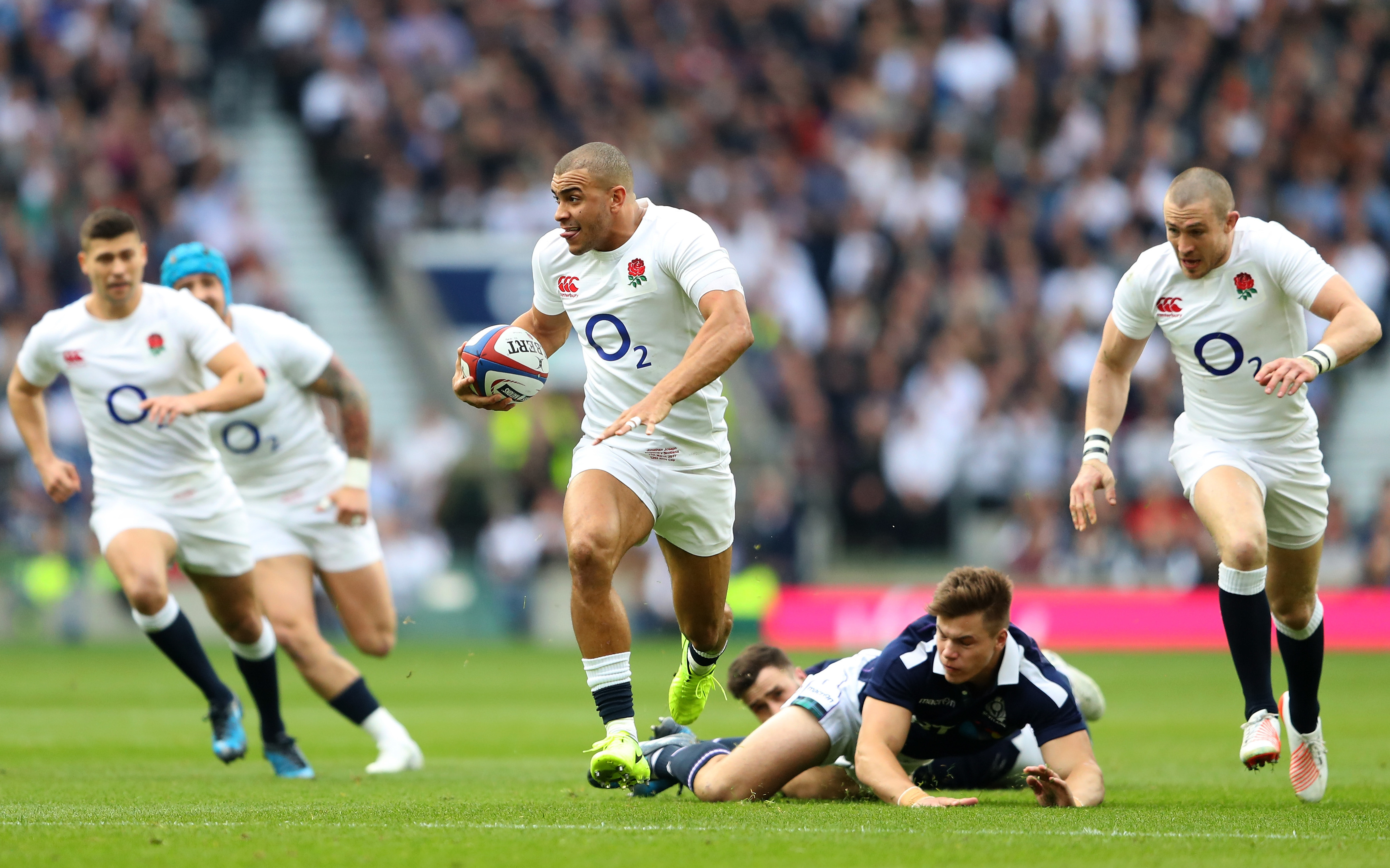 Jonathan Joseph goes through for England's first try in the Calcutta Cup match at Twickenham.