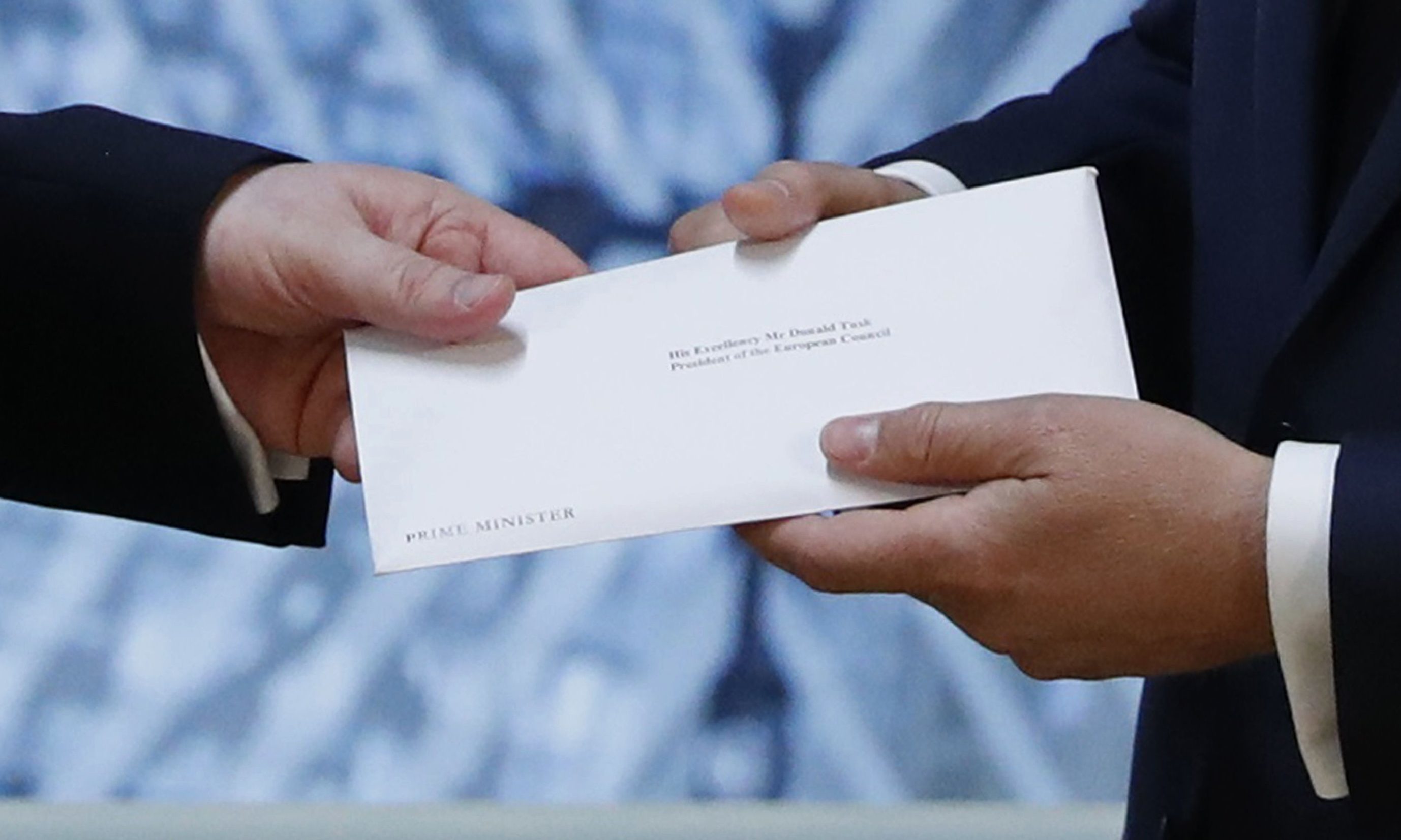 The letter that will formally trigger the beginning of Britain's exit from the European Union is handed over in Brussels.